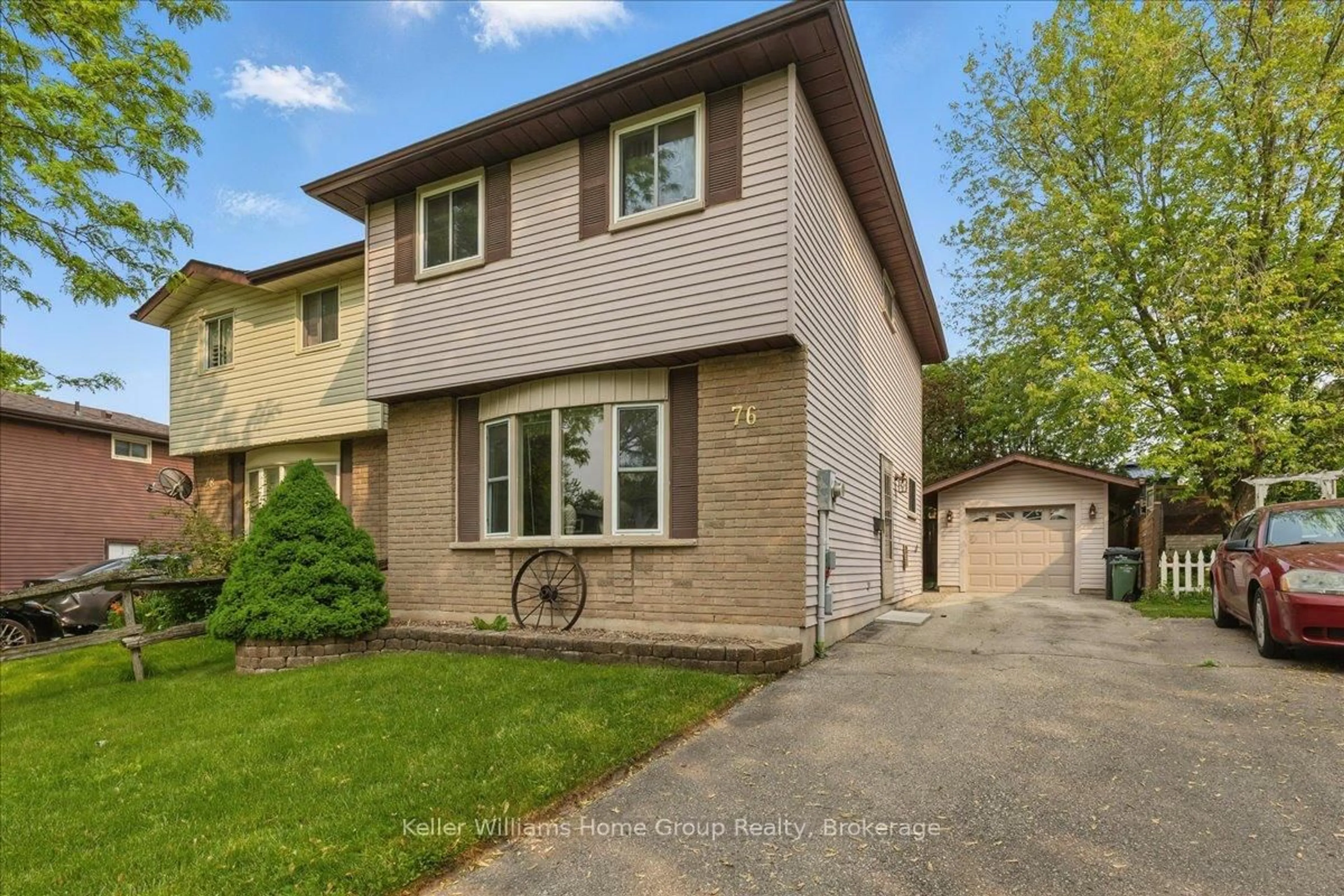Home with brick exterior material, street for 76 Upton Cres, Guelph Ontario N1E 6P5