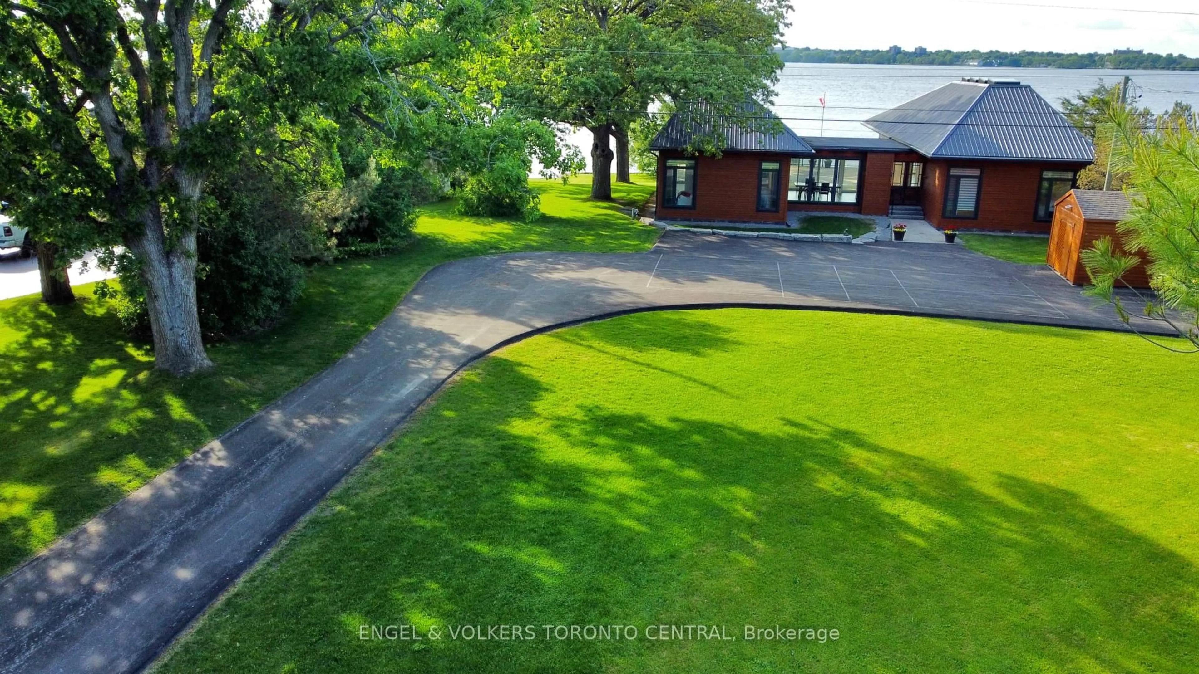 A pic from outside/outdoor area/front of a property/back of a property/a pic from drone, water/lake/river/ocean view for 131 Peats Point Rd, Prince Edward County Ontario K0K 1K0