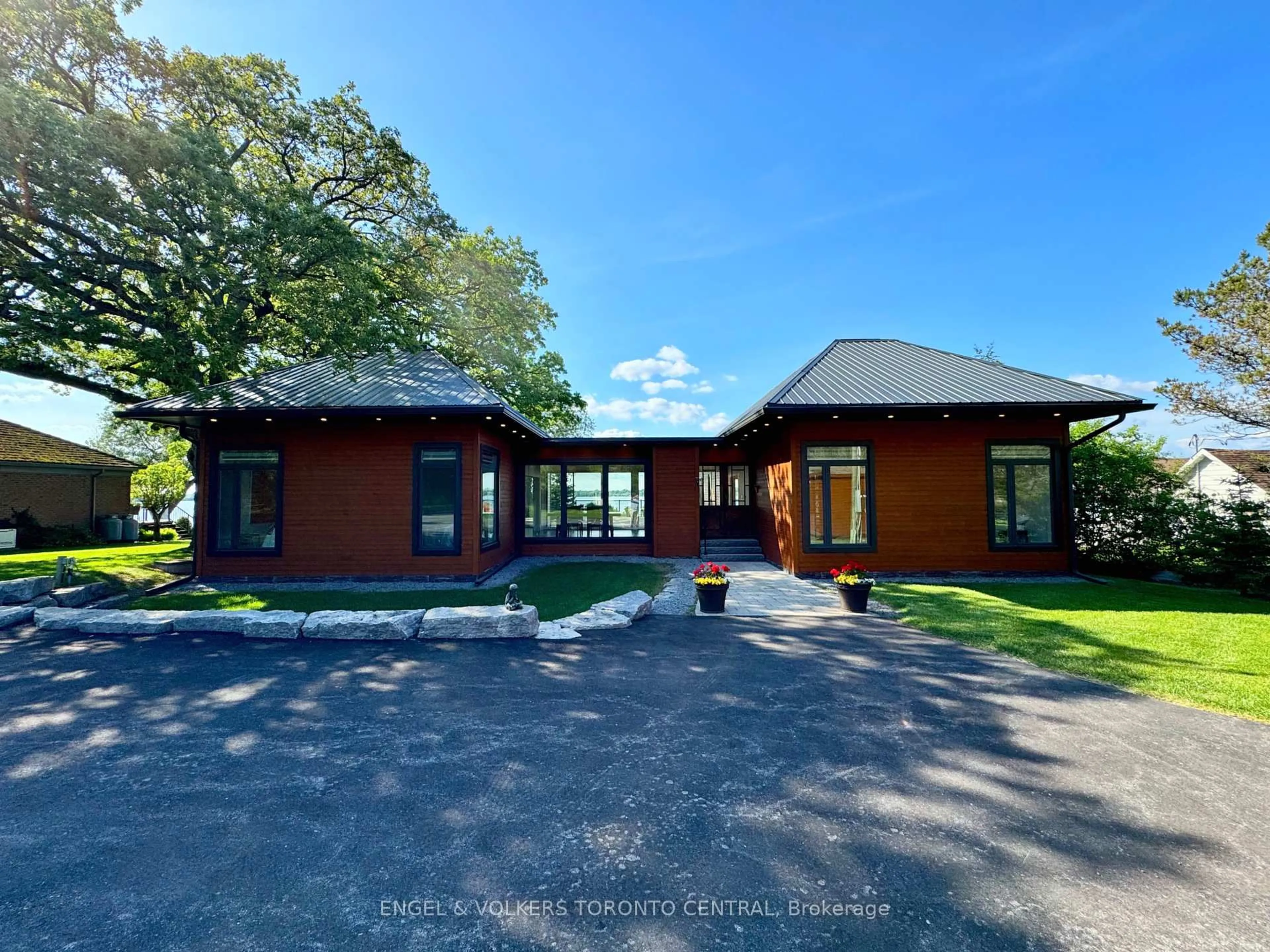 A pic from outside/outdoor area/front of a property/back of a property/a pic from drone, unknown for 131 Peats Point Rd, Prince Edward County Ontario K0K 1K0