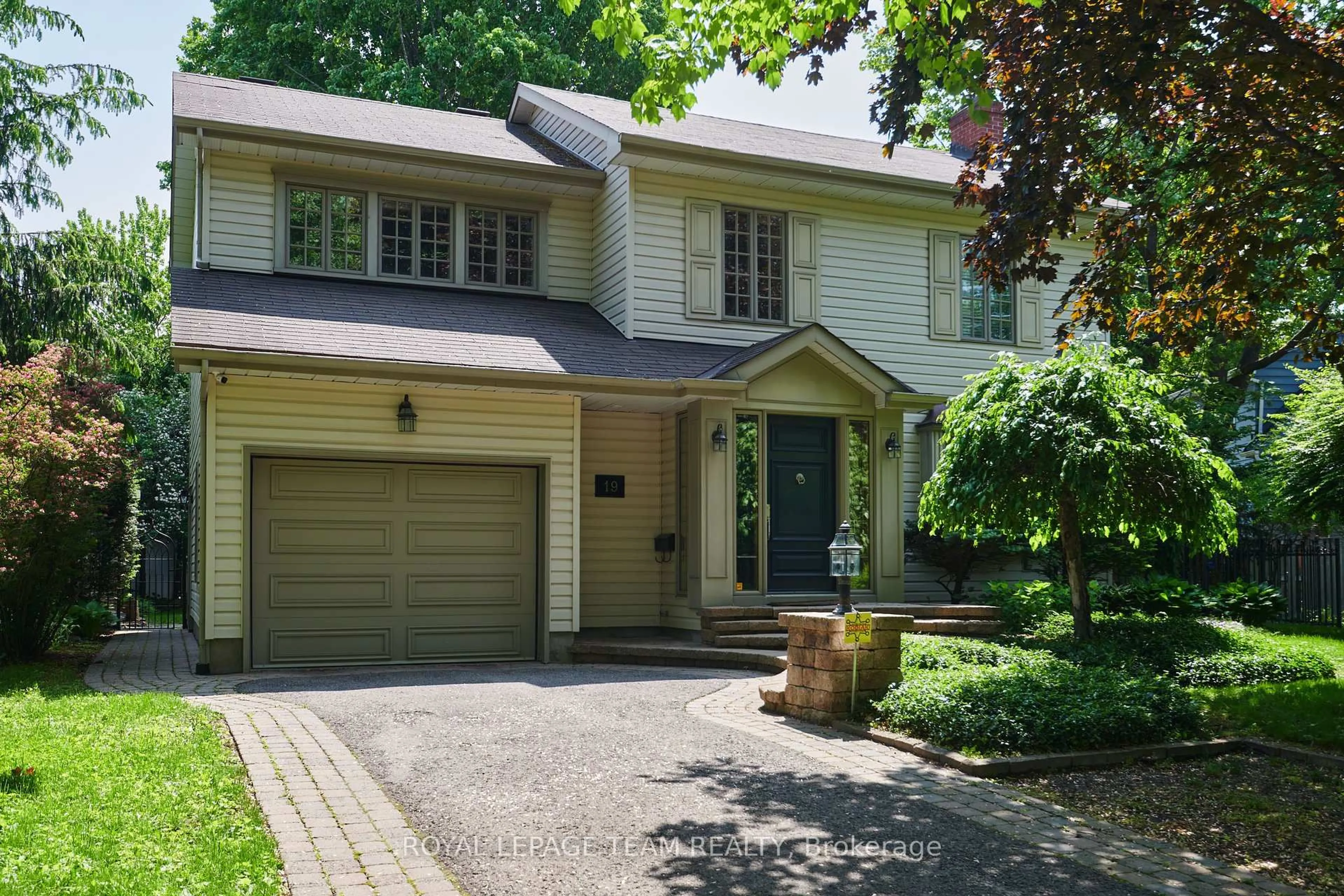 Home with brick exterior material, street for 19 Farnham Cres, Ottawa Ontario K1K 0E9