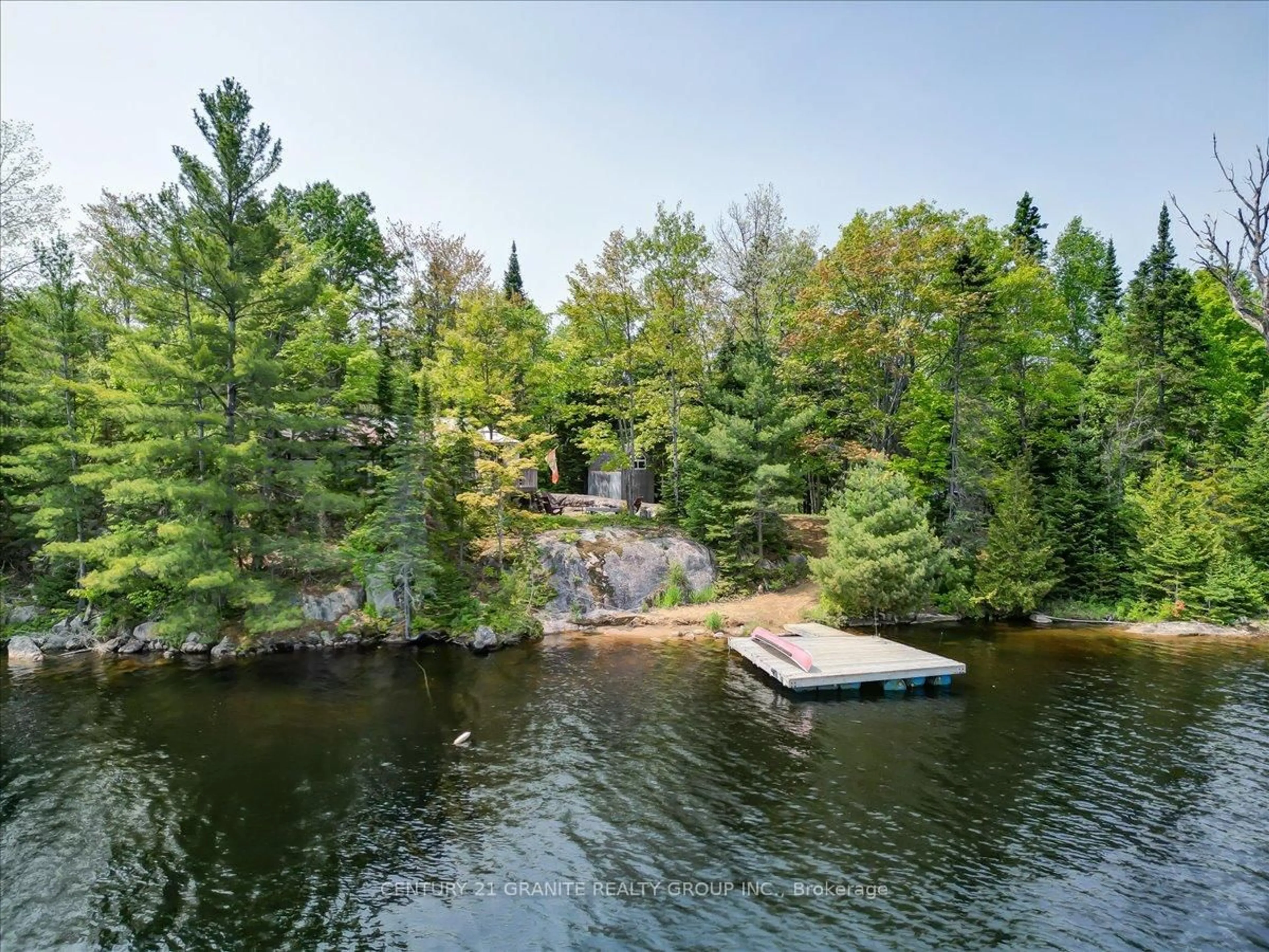 A pic from outside/outdoor area/front of a property/back of a property/a pic from drone, water/lake/river/ocean view for 1009 Gossamer Lane, Highlands East Ontario K0L 1C0