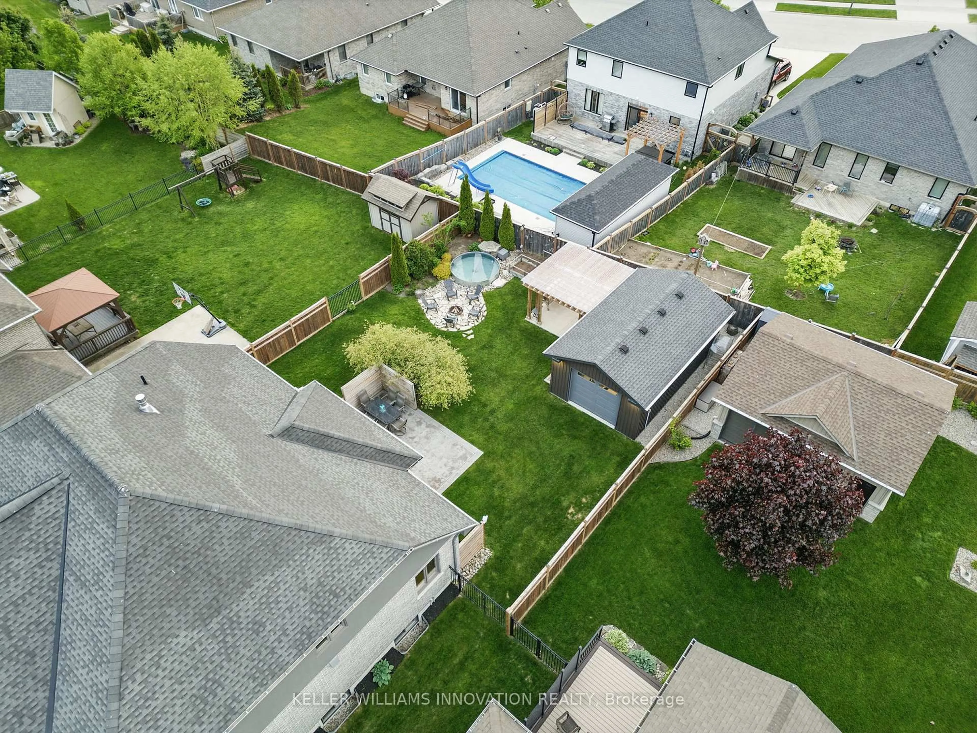 A pic from outside/outdoor area/front of a property/back of a property/a pic from drone, street for 855 Wood Dr, North Perth Ontario N4W 0B7