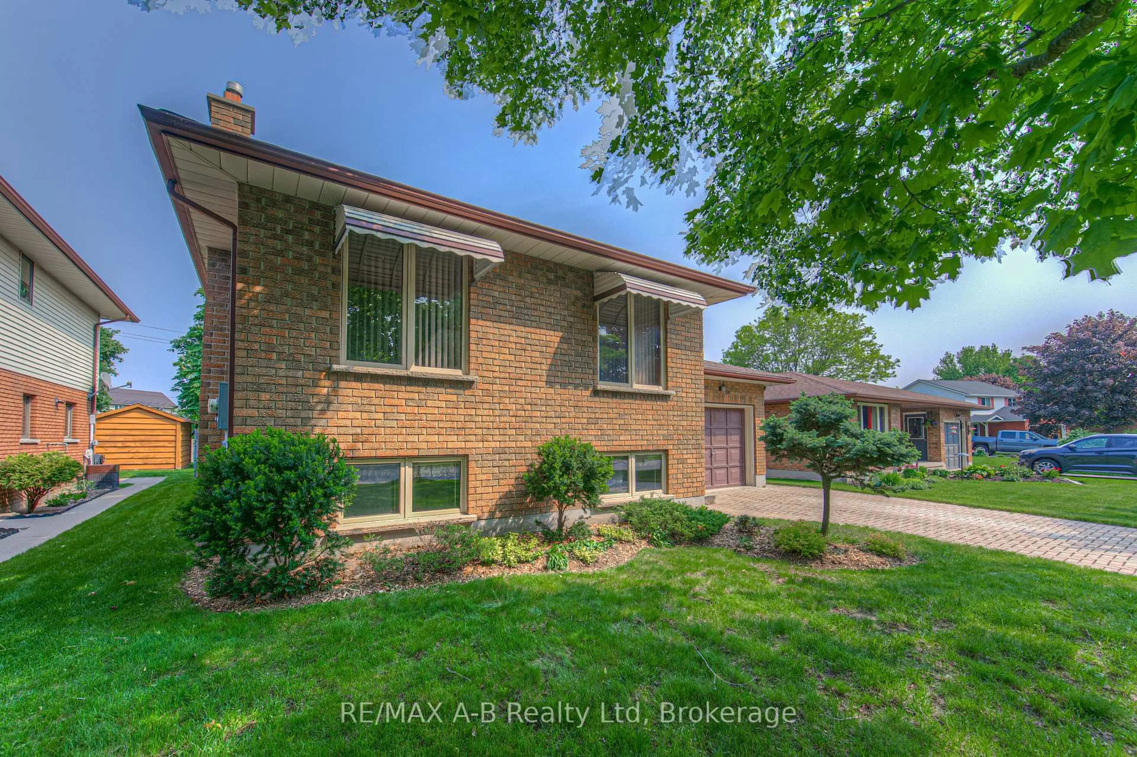 Home with brick exterior material, street for 23 Magwood Crt, Stratford Ontario N4Z 1G3