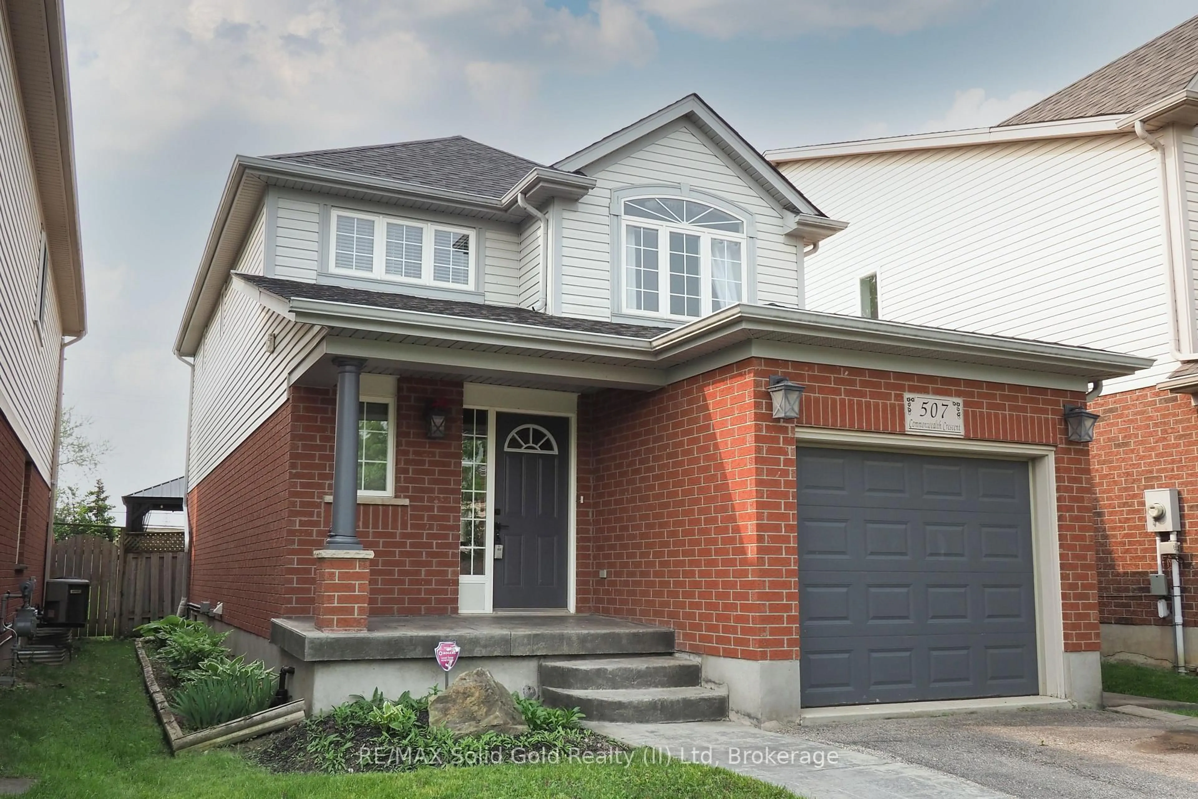 Home with brick exterior material, street for 507 Commonwealth Cres, Kitchener Ontario N2E 4K2