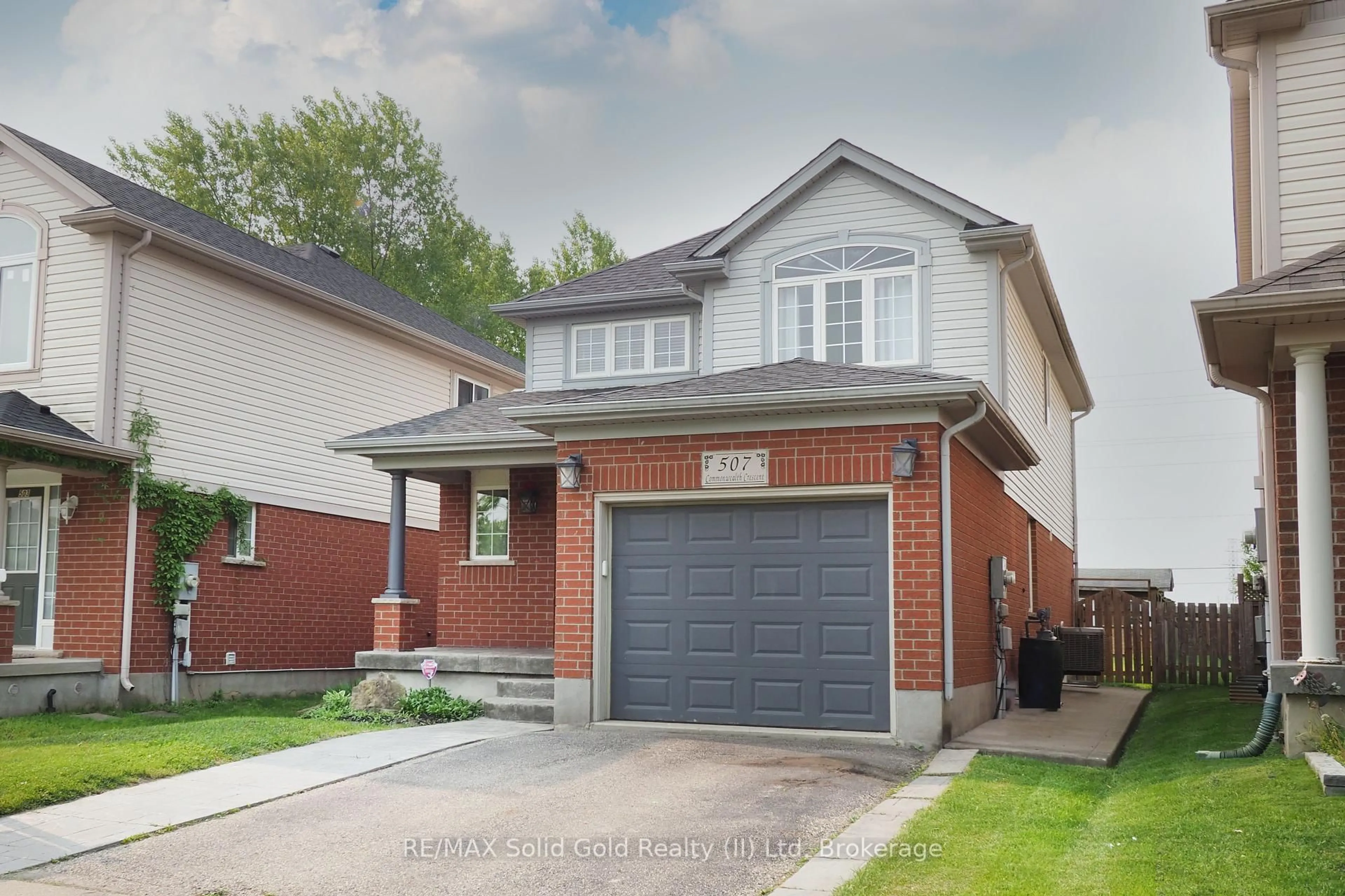 Home with brick exterior material, street for 507 Commonwealth Cres, Kitchener Ontario N2E 4K2