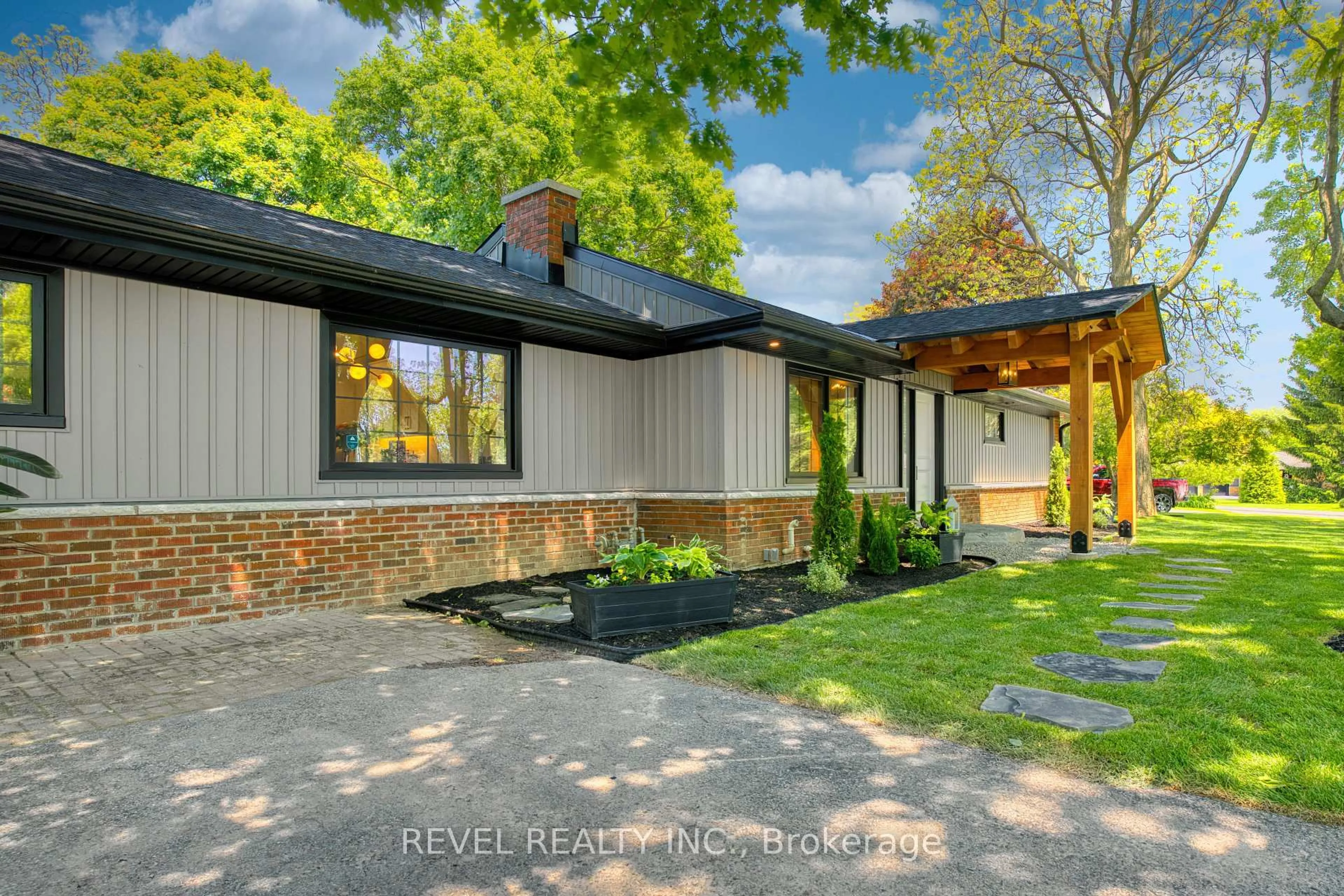 Home with brick exterior material, street for 793 Green Lane, London North Ontario N6H 2V2