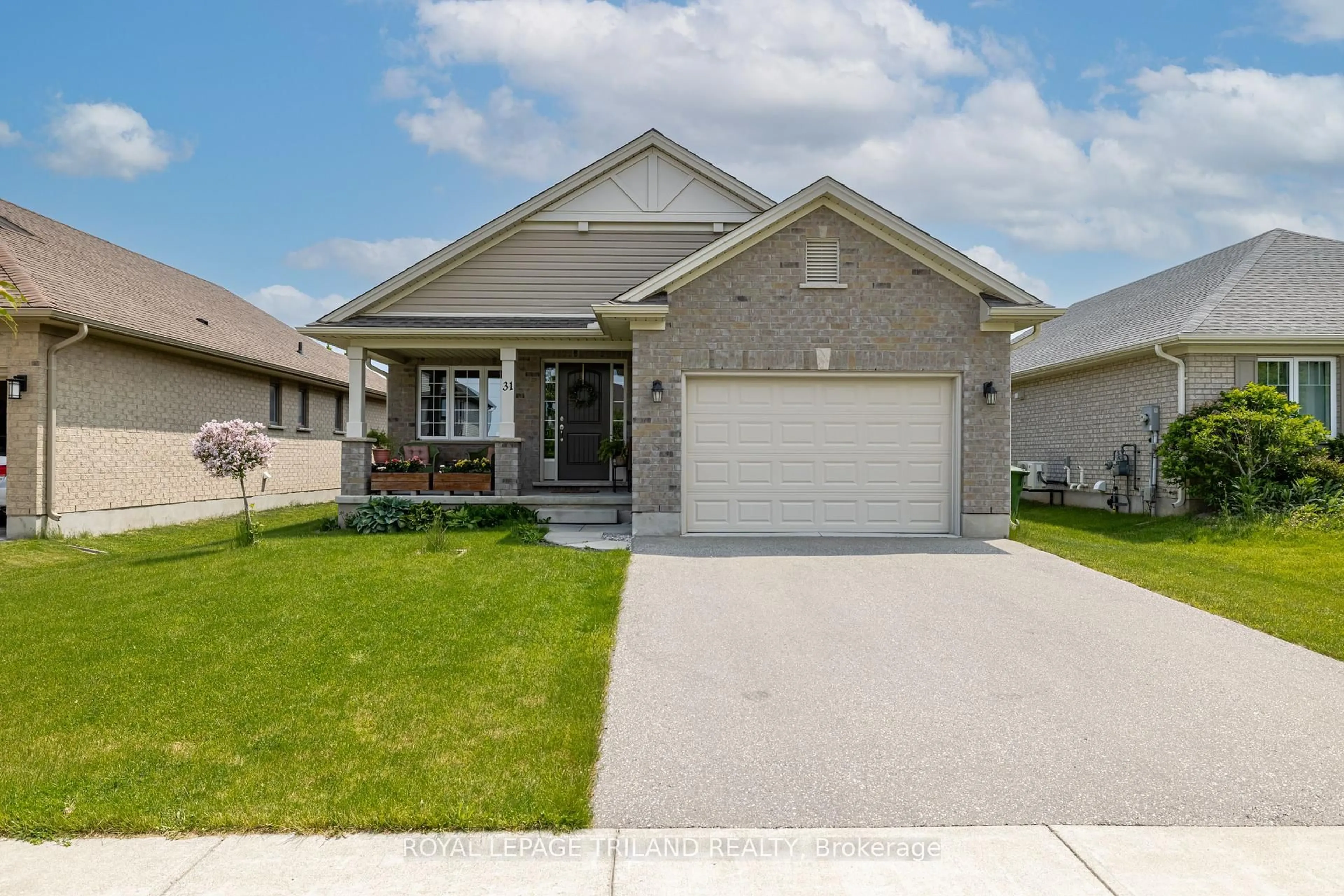 Home with brick exterior material, street for 31 Acorn Tr, St. Thomas Ontario N5R 0H5