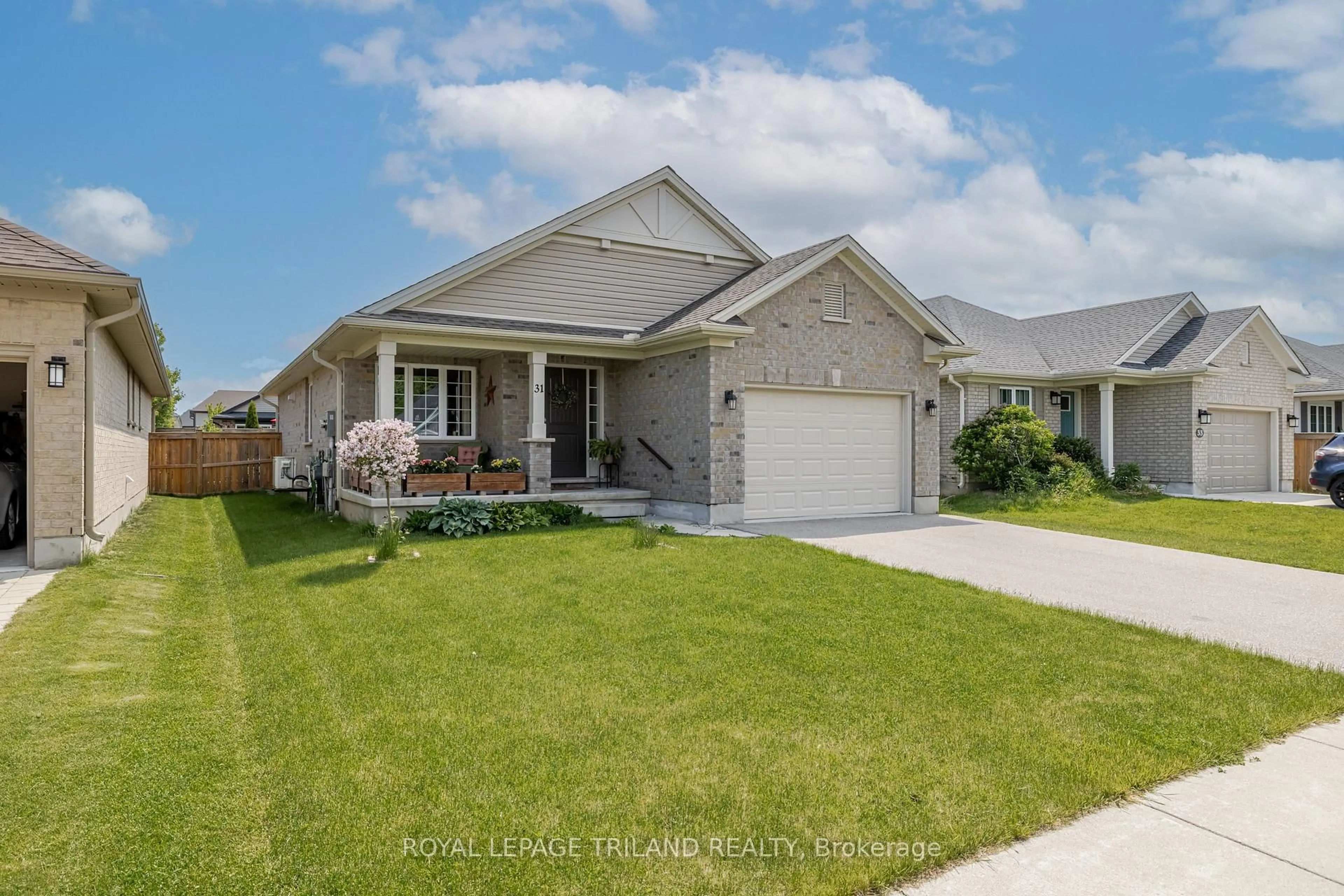 Home with vinyl exterior material, street for 31 Acorn Tr, St. Thomas Ontario N5R 0H5