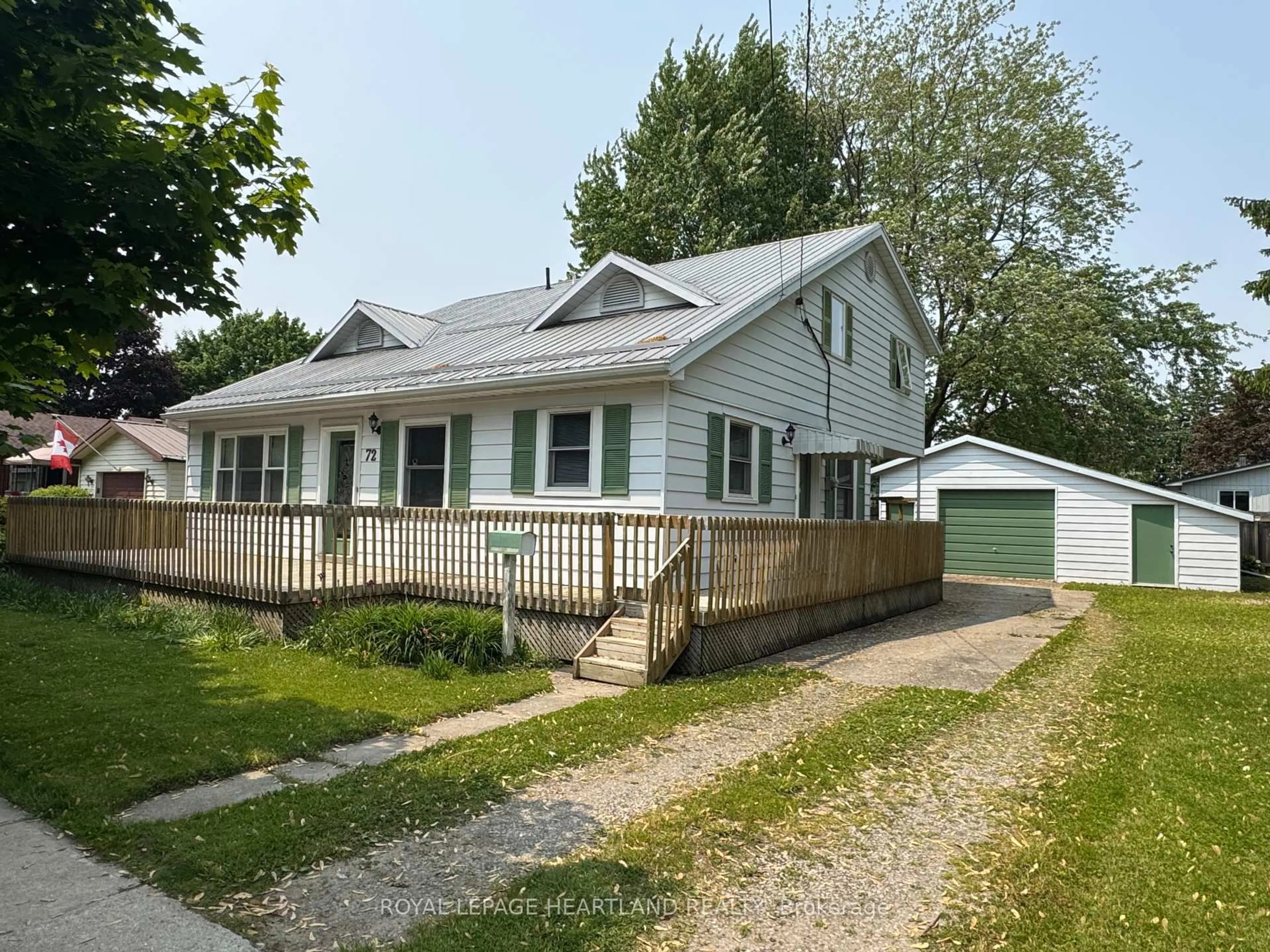 A pic from outside/outdoor area/front of a property/back of a property/a pic from drone, street for 72 Thomas St, South Huron Ontario N0M 1S2