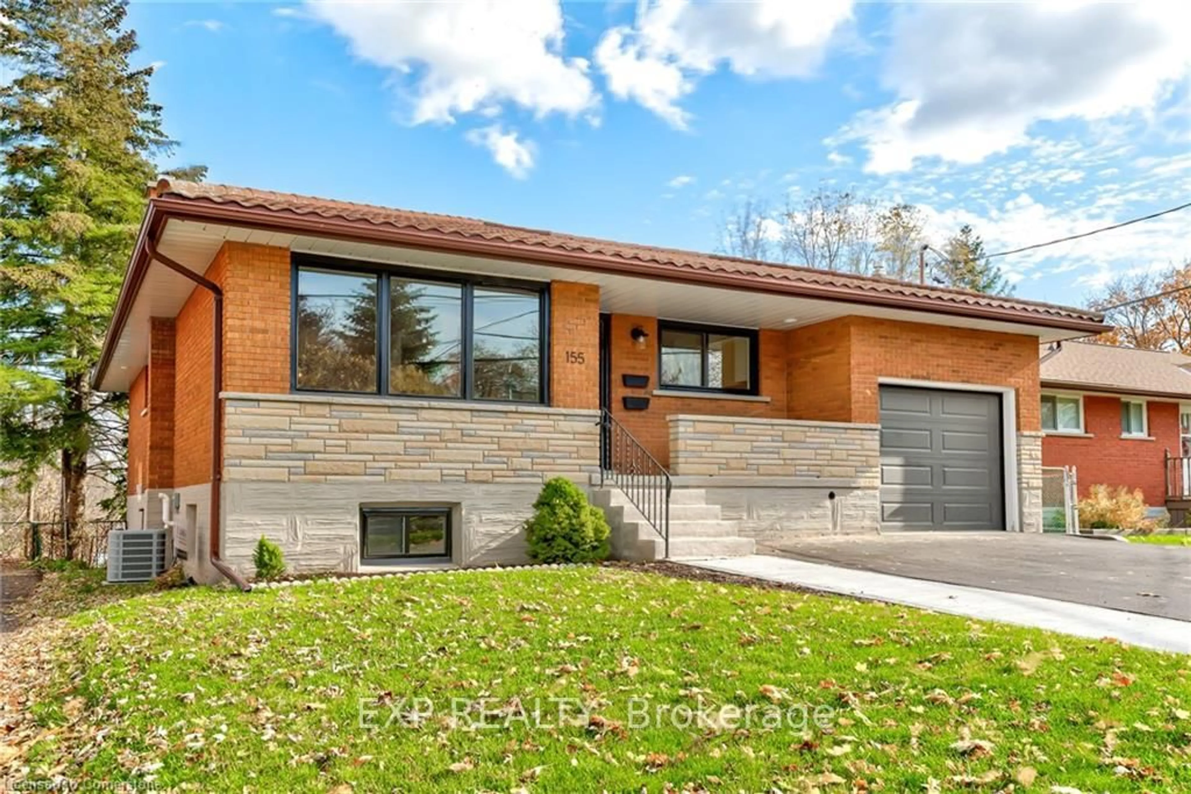 Home with brick exterior material, street for 155 Doon Rd, Kitchener Ontario N2G 3E1
