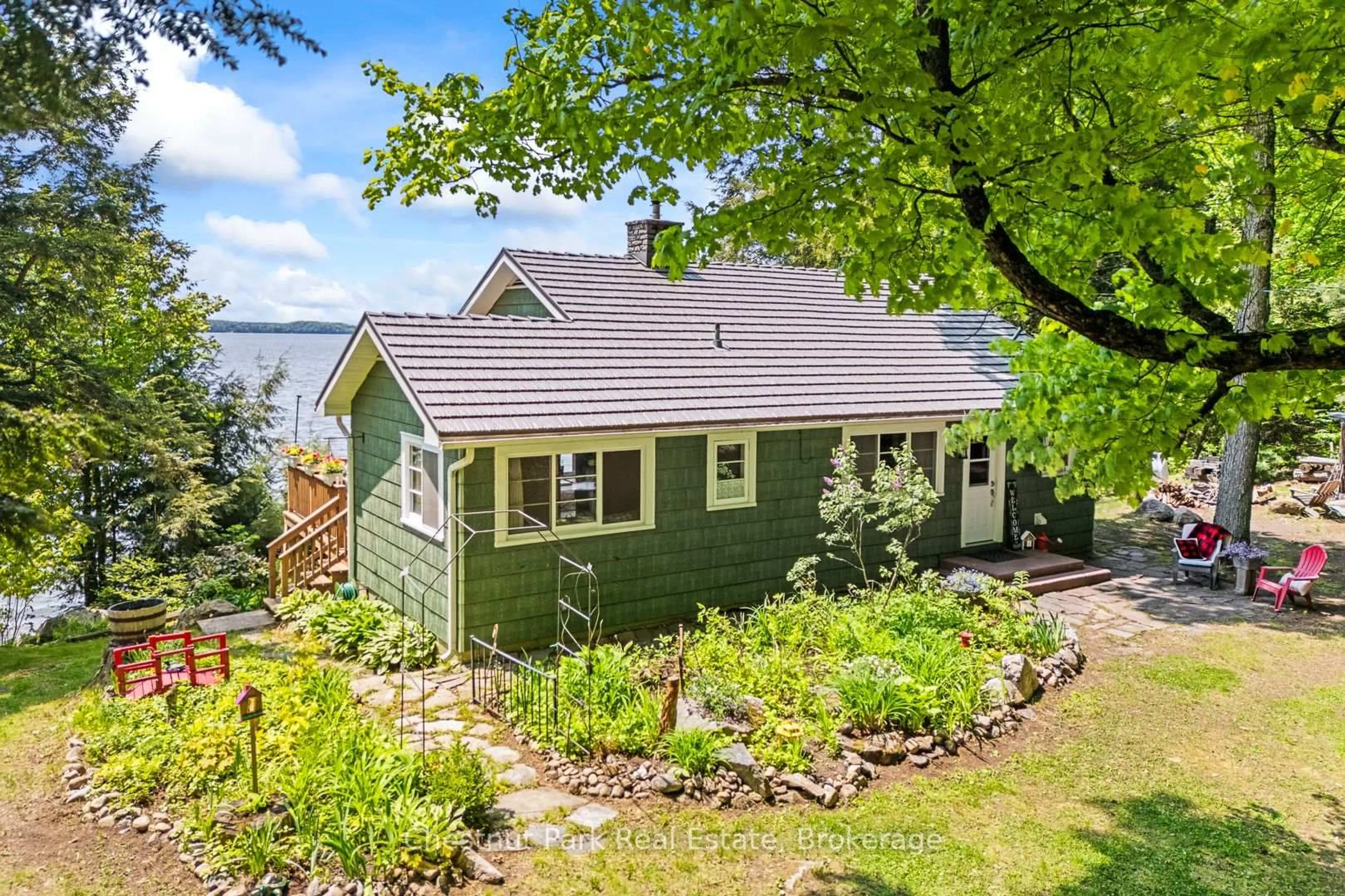 A pic from outside/outdoor area/front of a property/back of a property/a pic from drone, water/lake/river/ocean view for 199 Long Point Rd, Huntsville Ontario P0B 1M0