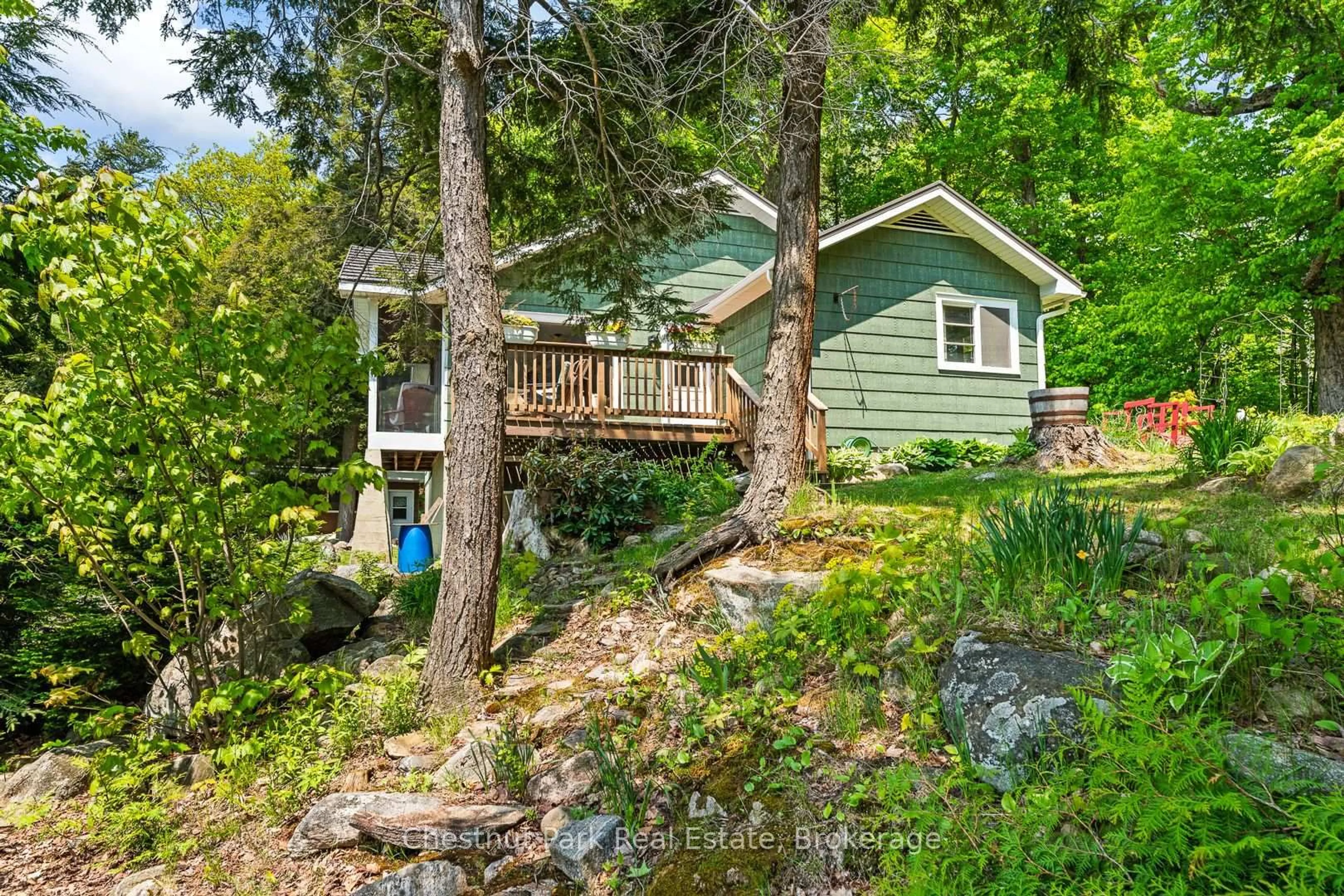 A pic from outside/outdoor area/front of a property/back of a property/a pic from drone, water/lake/river/ocean view for 199 Long Point Rd, Huntsville Ontario P0B 1M0