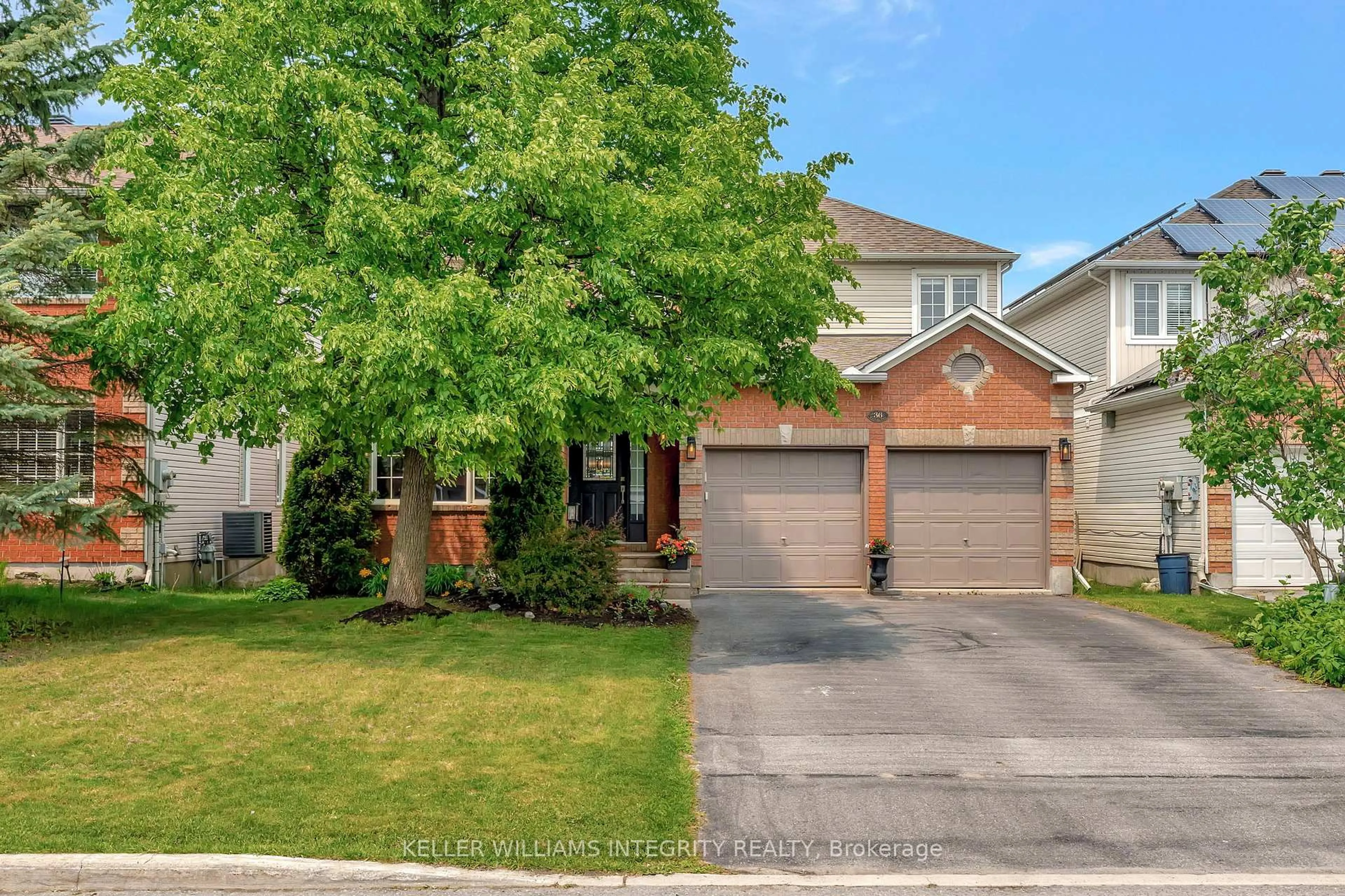 Home with brick exterior material, street for 36 Kittiwake Dr, Stittsville Ontario K2S 1Z5