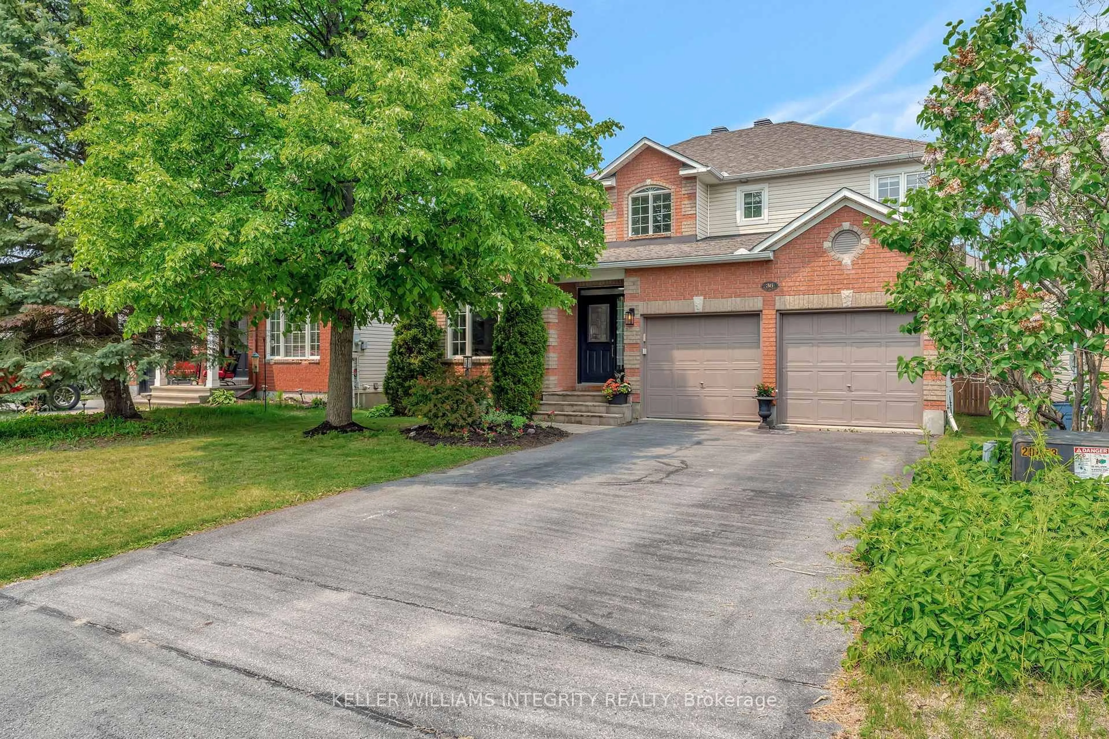 Home with brick exterior material, street for 36 Kittiwake Dr, Stittsville Ontario K2S 1Z5