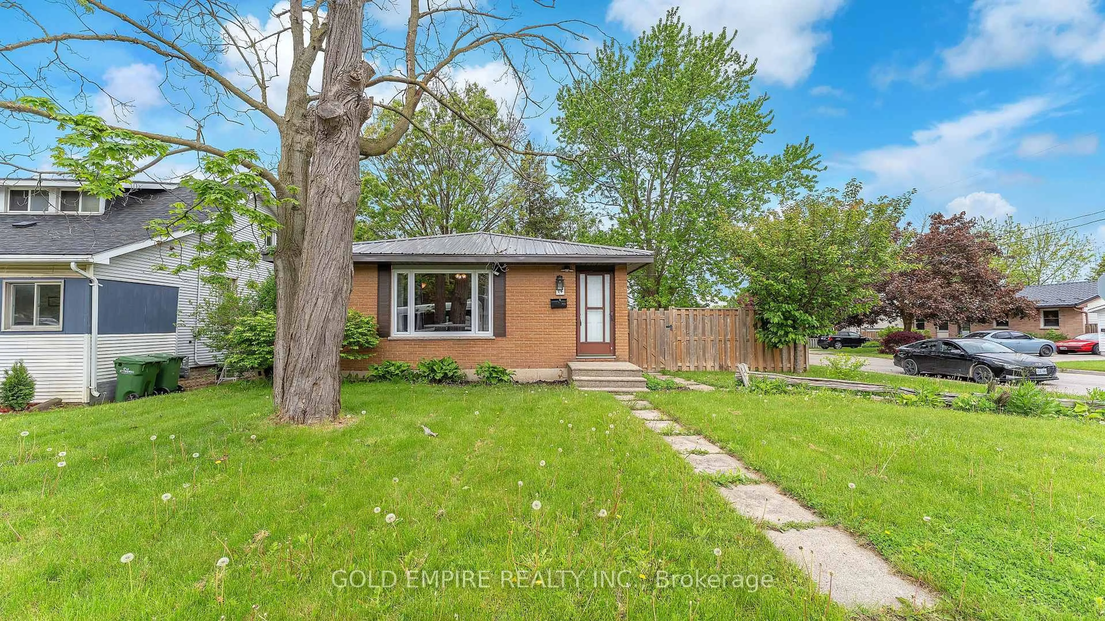 Home with brick exterior material, street for 14 Fairview Ave, St. Thomas Ontario N5R 4X4