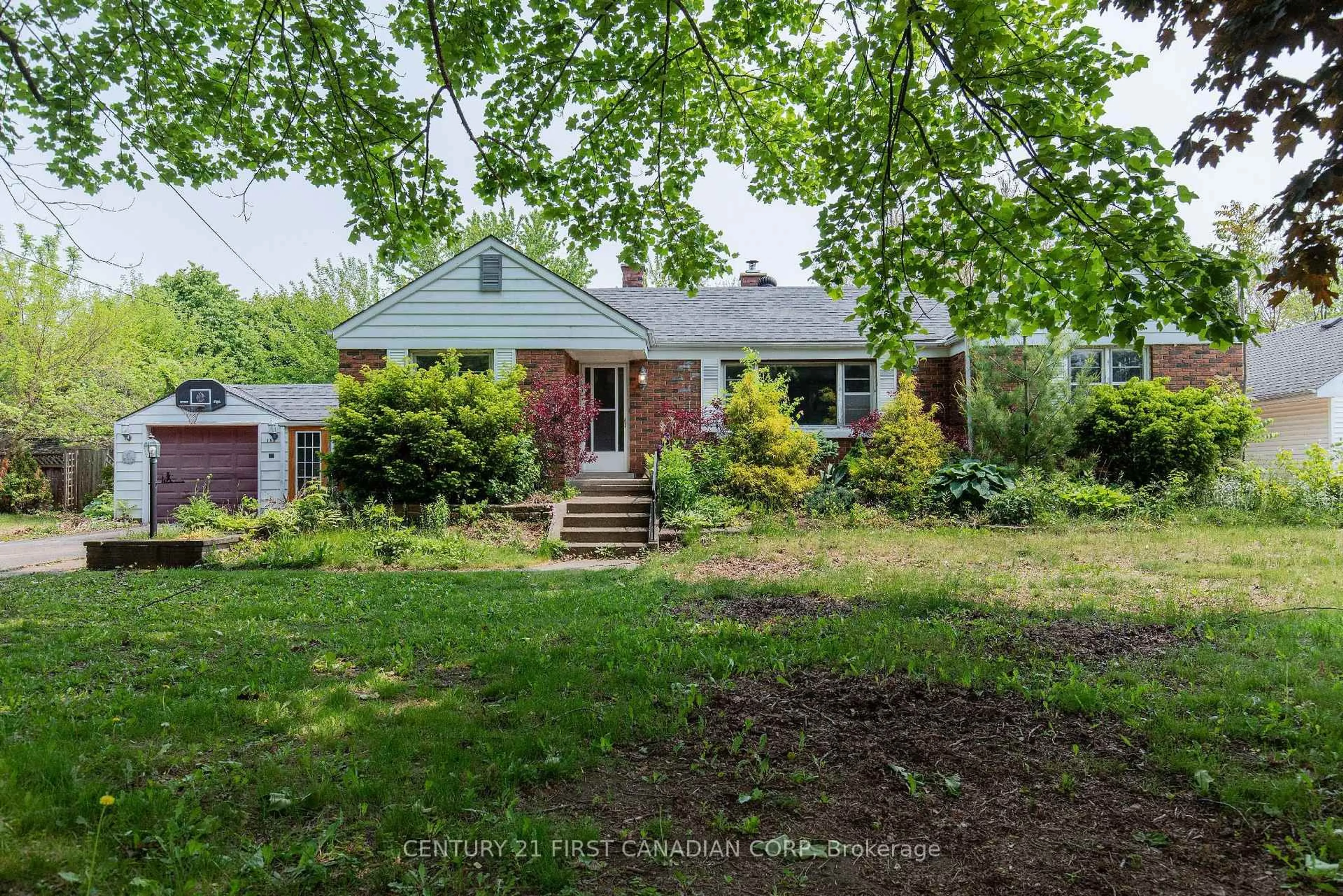 A pic from outside/outdoor area/front of a property/back of a property/a pic from drone, street for 153 Graham Rd, West Elgin Ontario N0L 2P0
