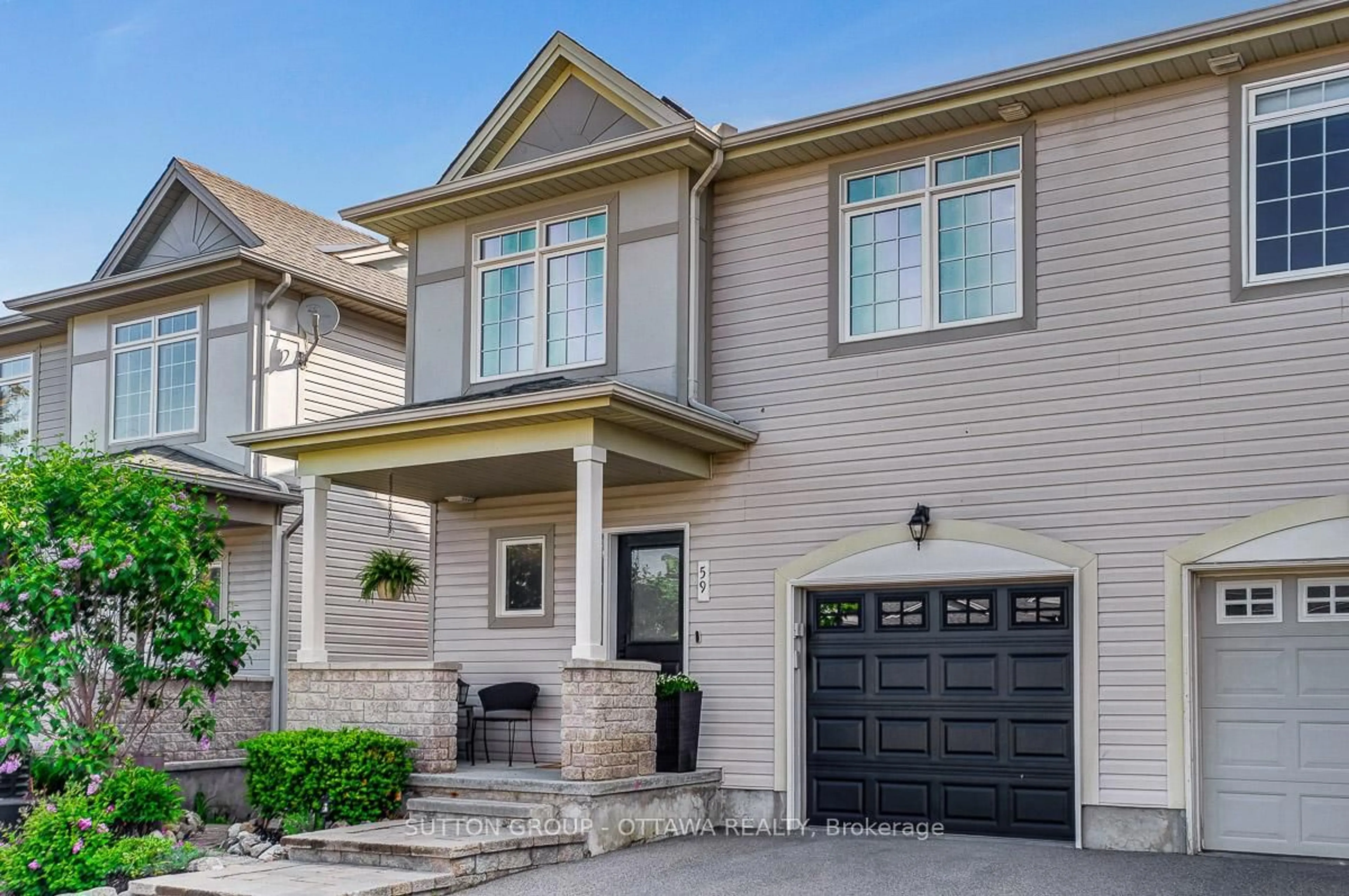 Home with brick exterior material, street for 59 Village Walk Private, Manotick Ontario K4M 1L1