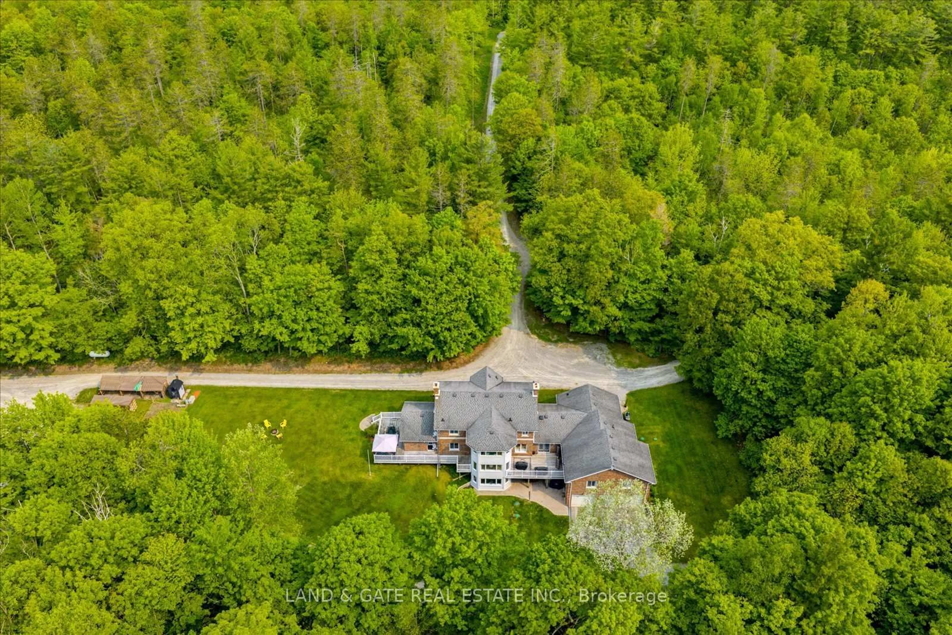 A pic from outside/outdoor area/front of a property/back of a property/a pic from drone, forest/trees view for 398 Sandy Hook Rd, Kawartha Lakes Ontario L0A 1K0