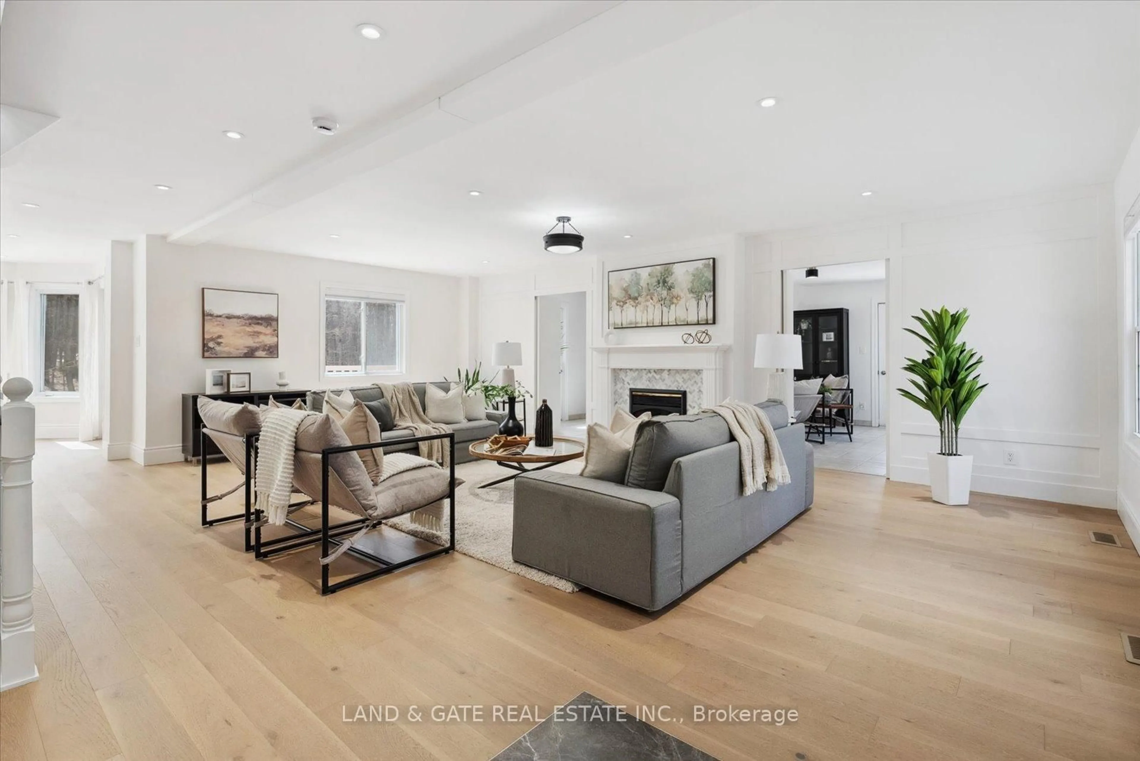 Living room with furniture, wood/laminate floor for 398 Sandy Hook Rd, Kawartha Lakes Ontario L0A 1K0
