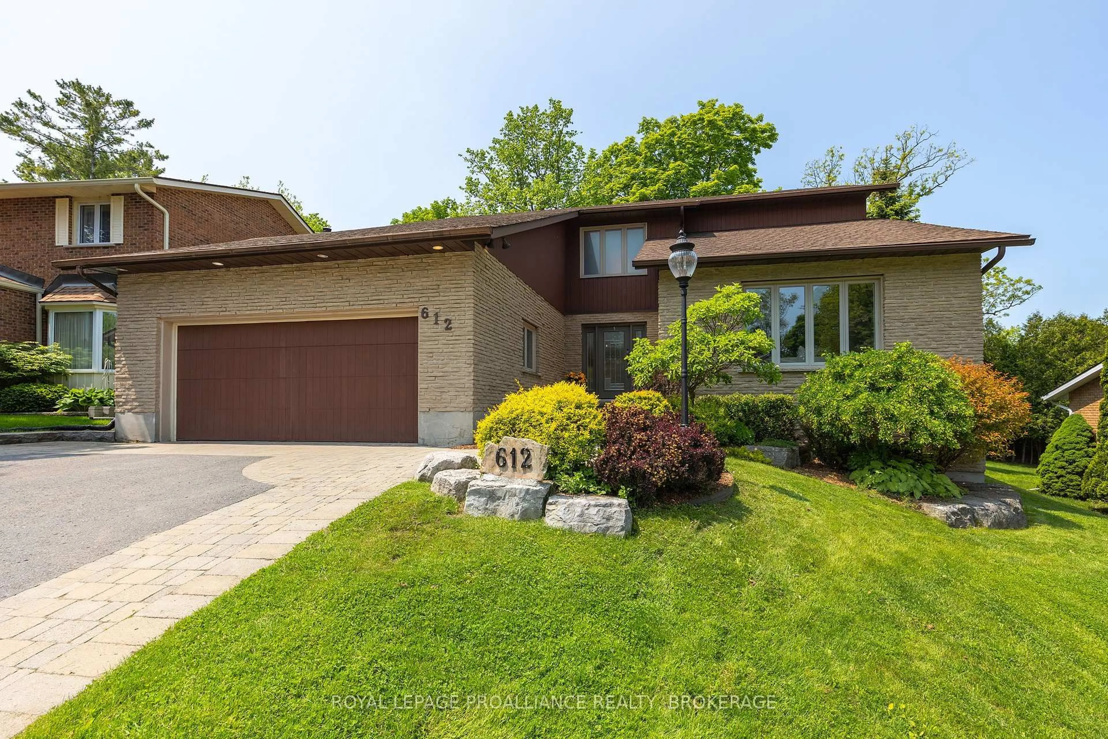 Home with brick exterior material, street for 612 Rankin Cres, Kingston Ontario K7M 7L4