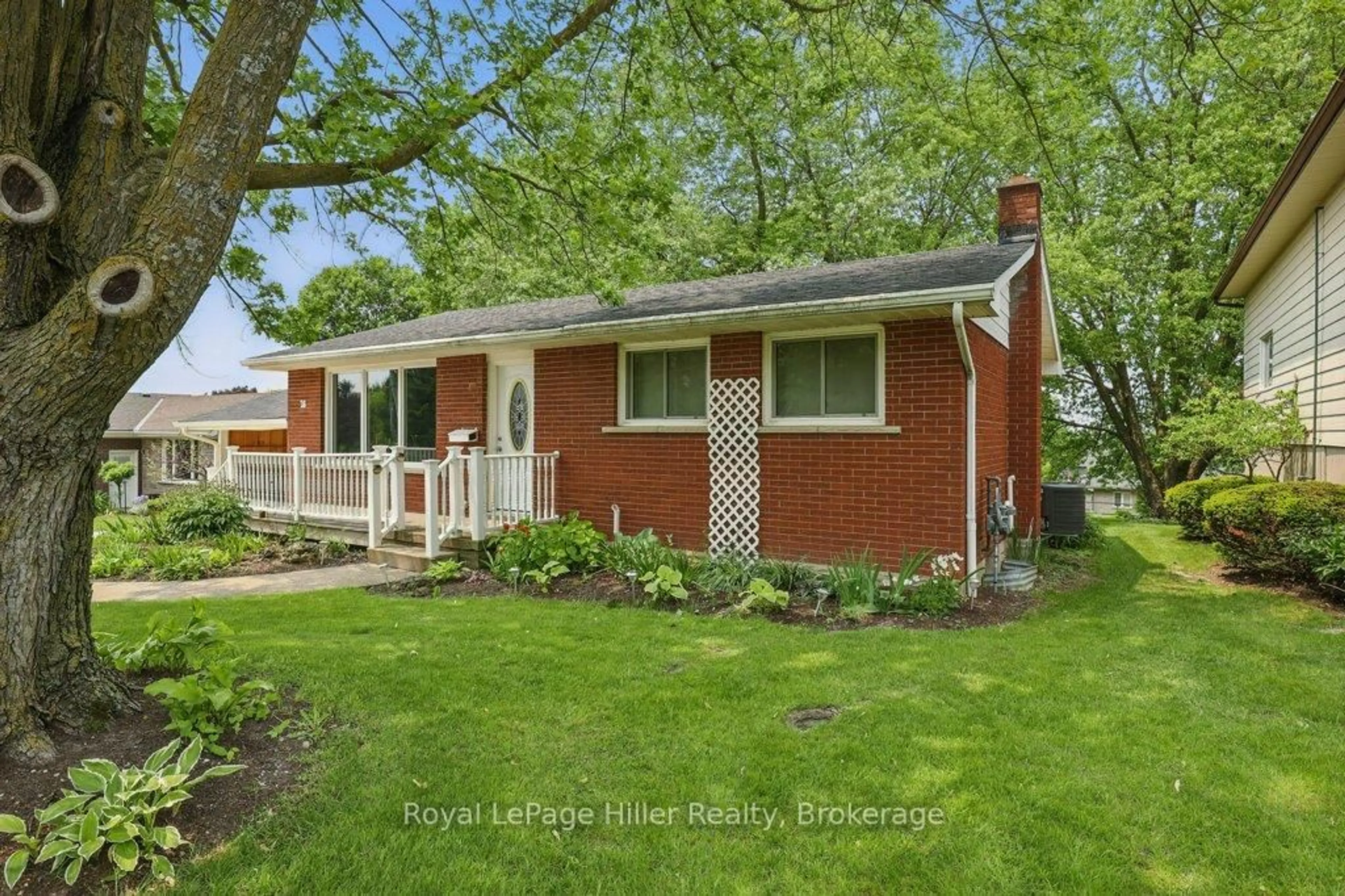 Home with brick exterior material, street for 26 Arena Dr, Perth East Ontario N0K 1M0