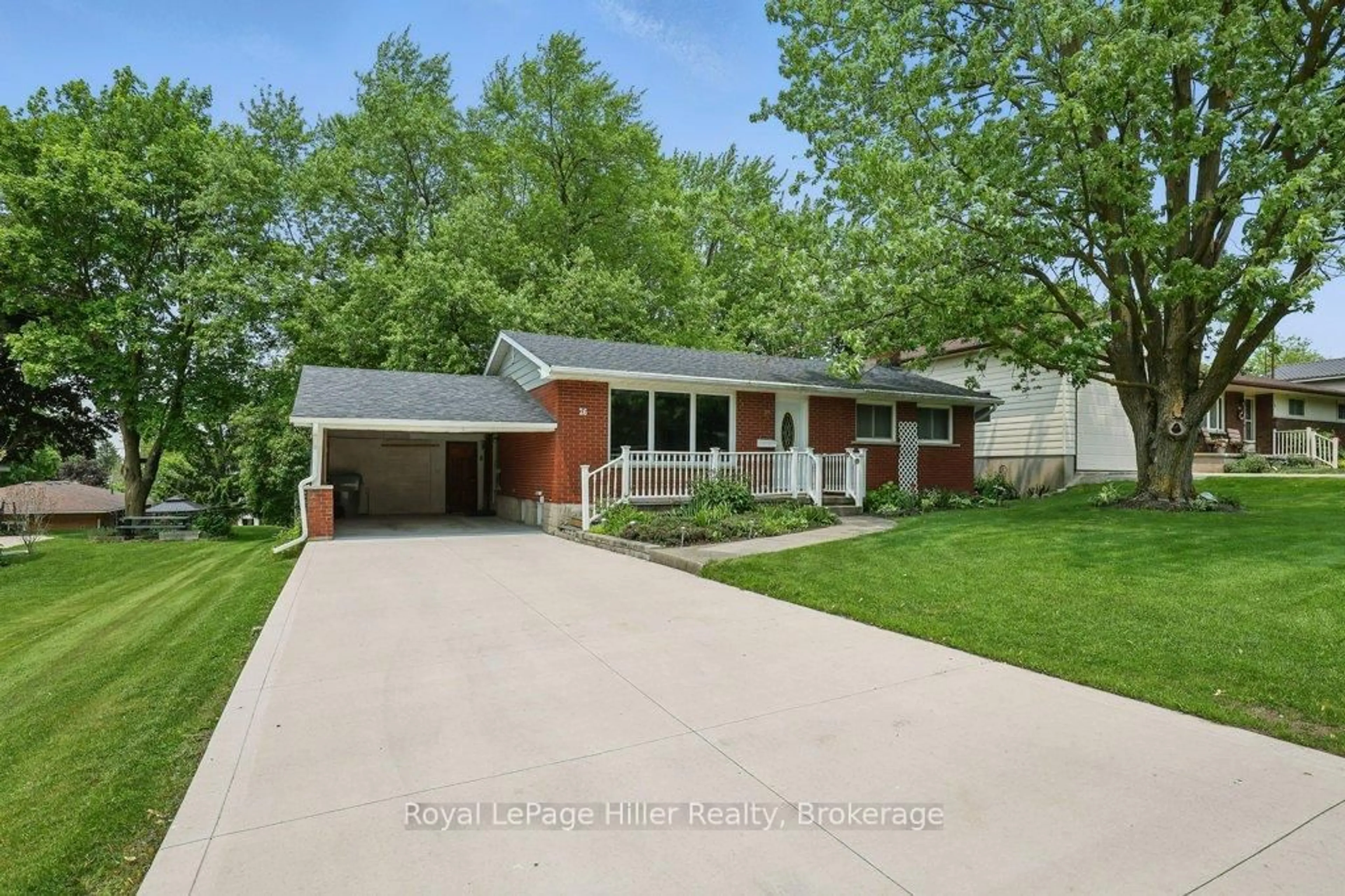 Home with brick exterior material, street for 26 Arena Dr, Perth East Ontario N0K 1M0