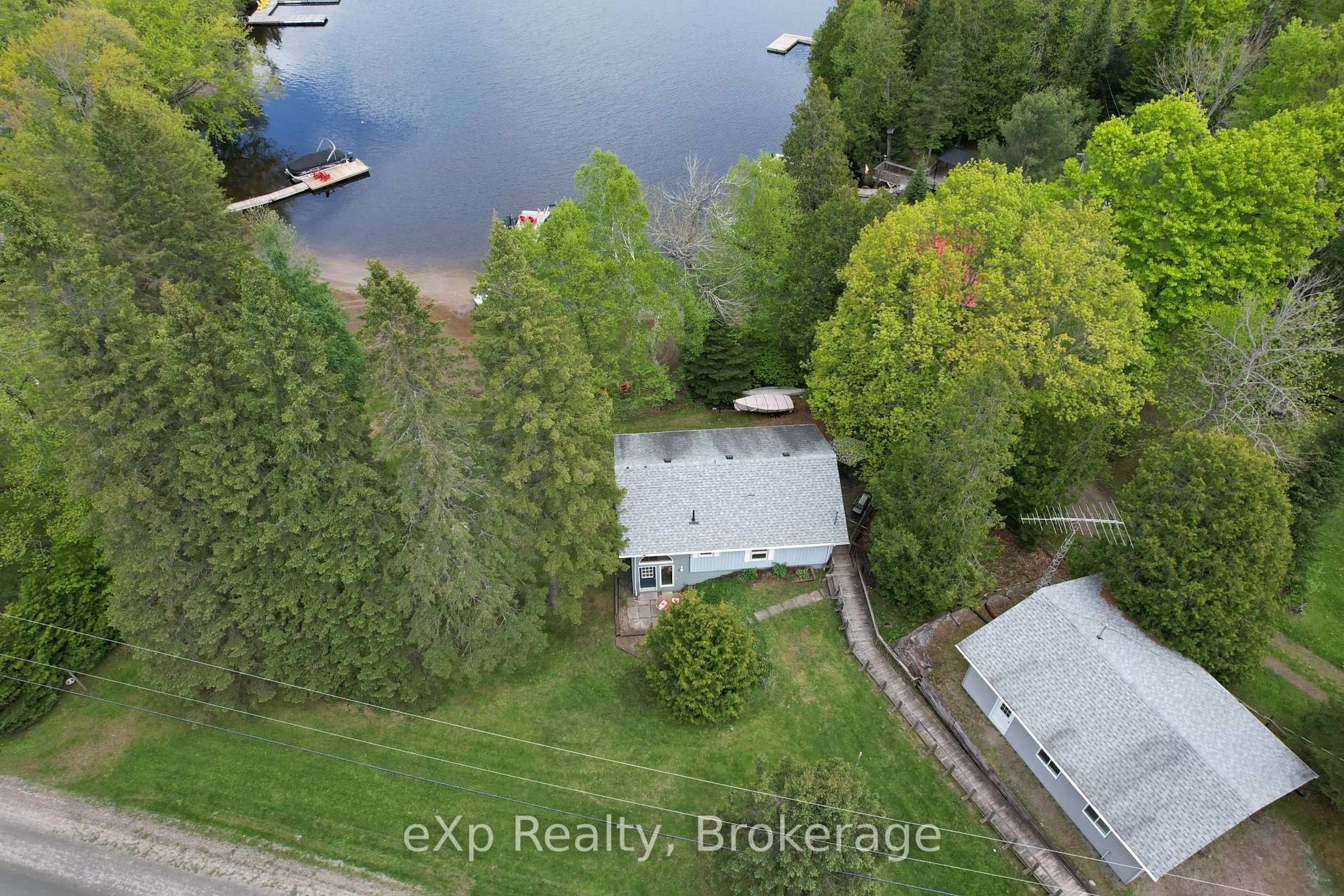 A pic from outside/outdoor area/front of a property/back of a property/a pic from drone, water/lake/river/ocean view for 91 Farleys Rd, Whitestone Ontario P0A 1G0