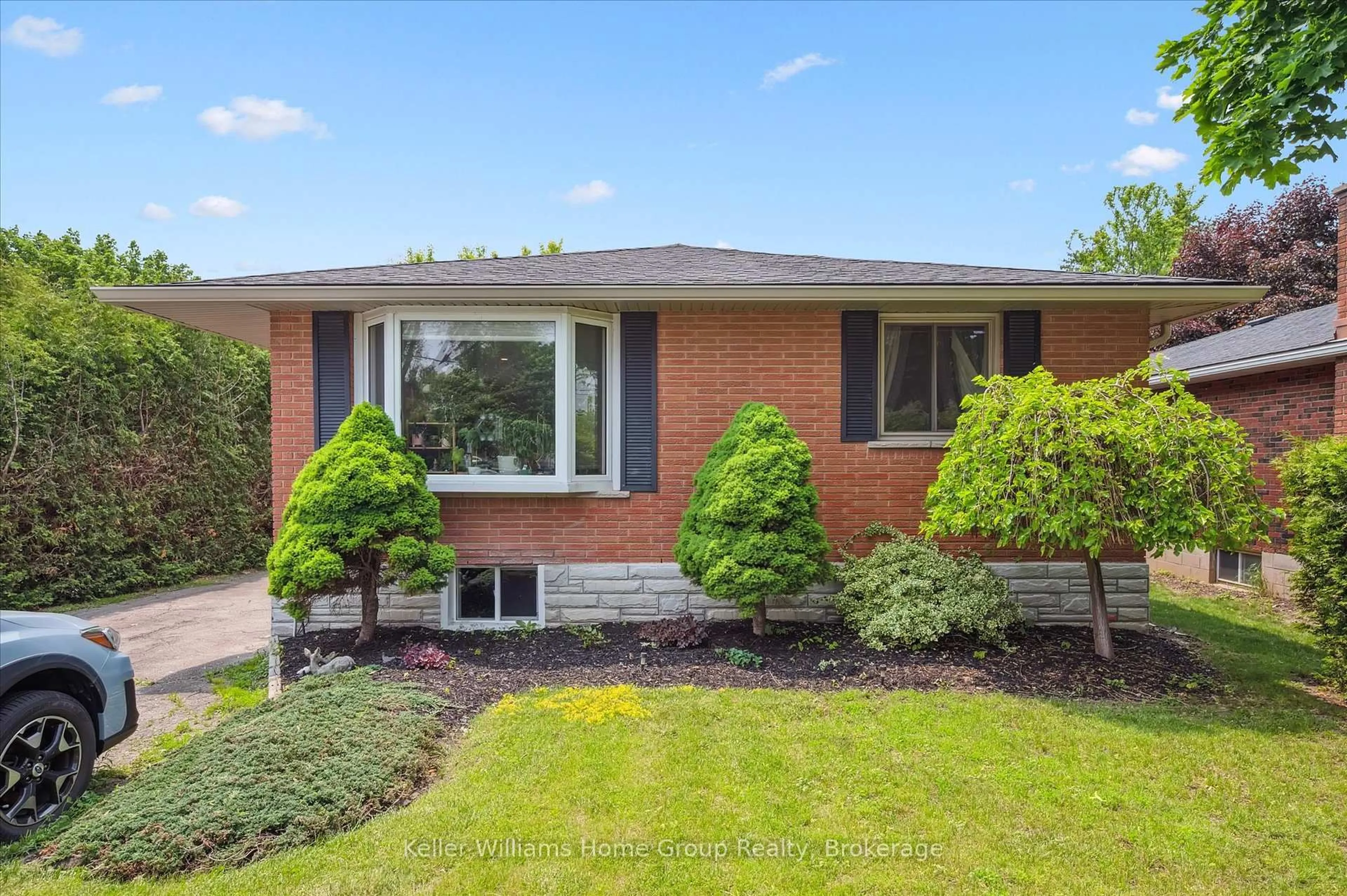 Home with brick exterior material, street for 234 Delhi St, Guelph Ontario N1E 4K2