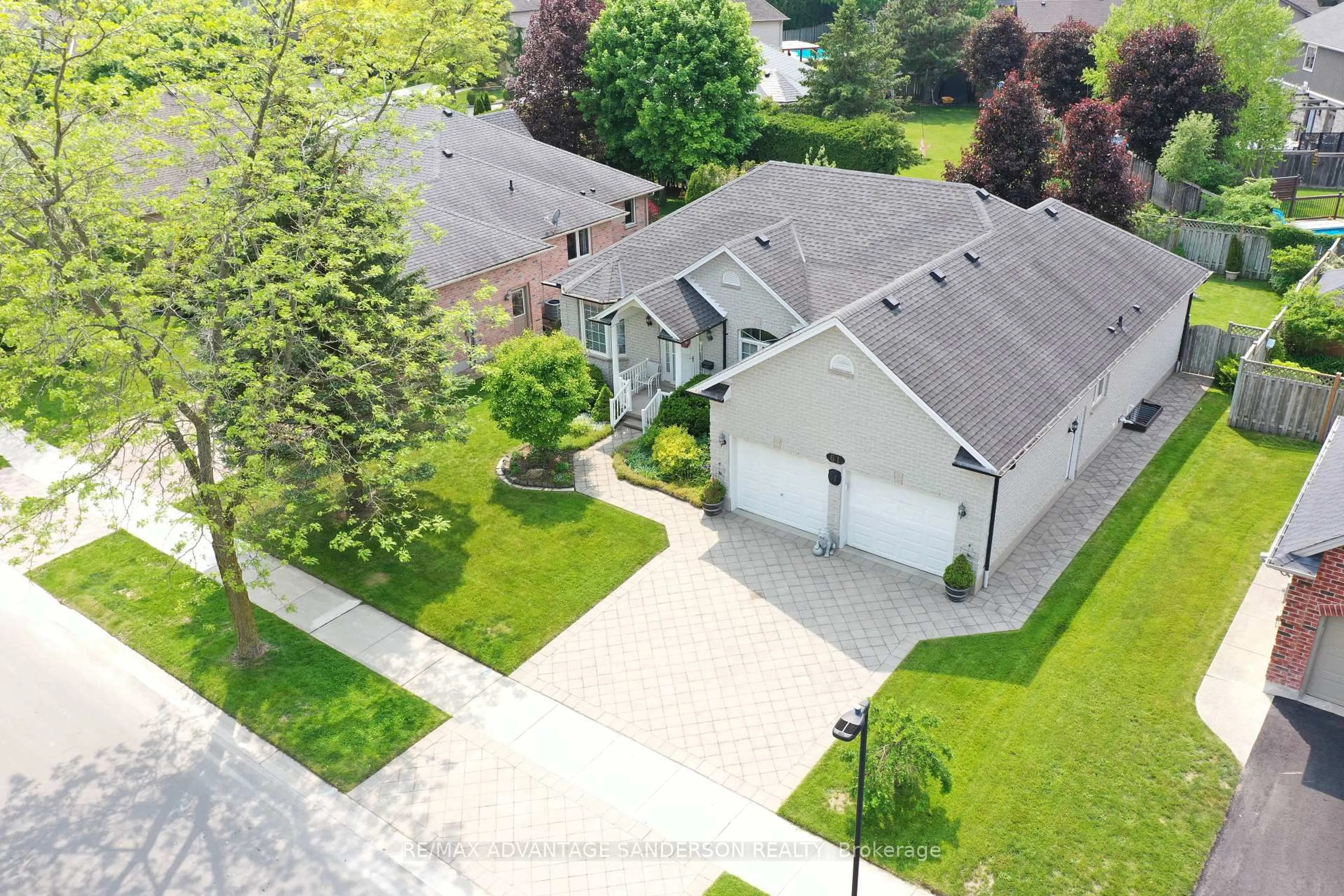 A pic from outside/outdoor area/front of a property/back of a property/a pic from drone, street for 61 Calvert Lane, Middlesex Centre Ontario N0M 2A0