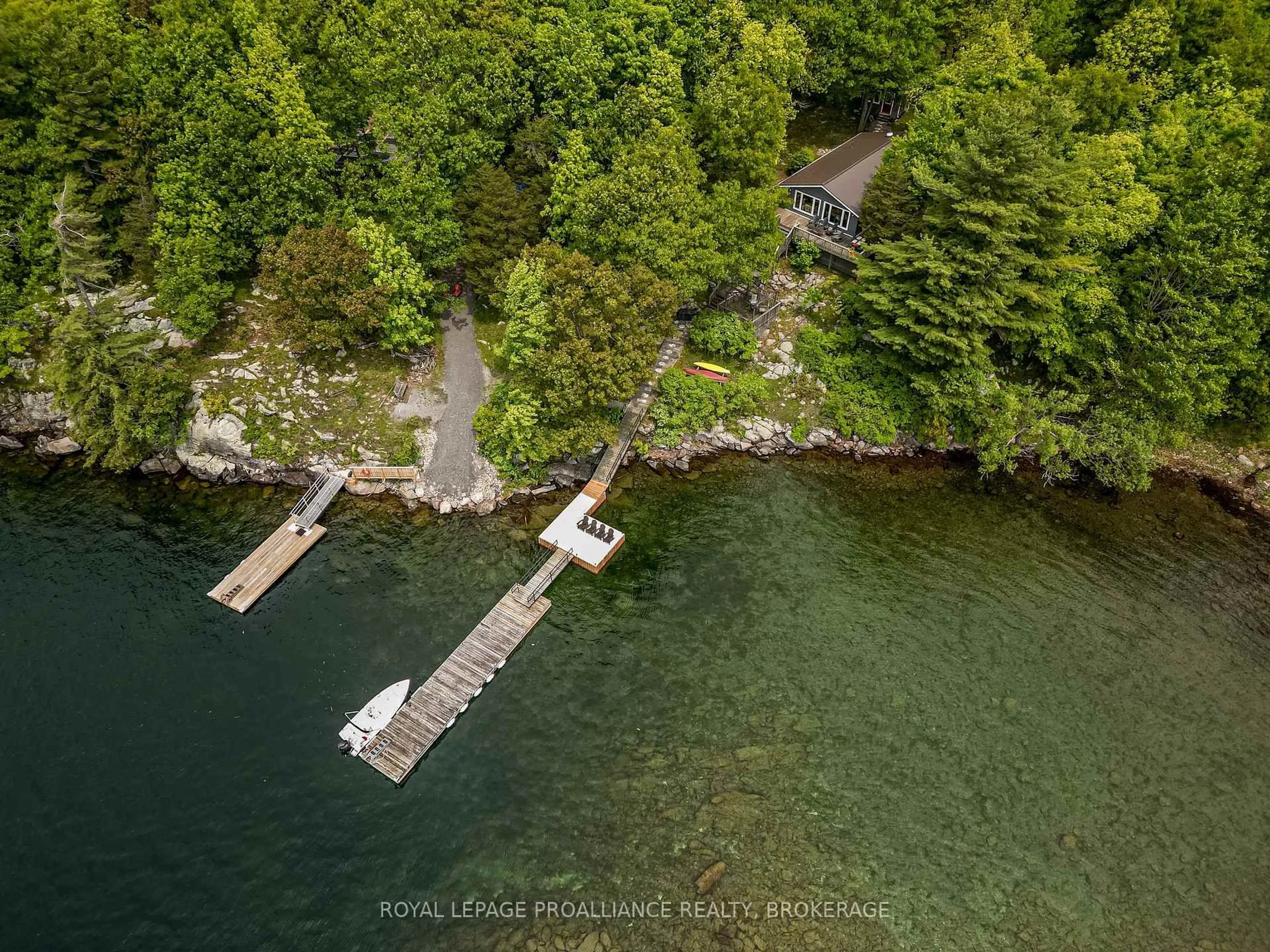 A pic from outside/outdoor area/front of a property/back of a property/a pic from drone, water/lake/river/ocean view for 459 Ash Island, Lansdowne Ontario K0E 1L0