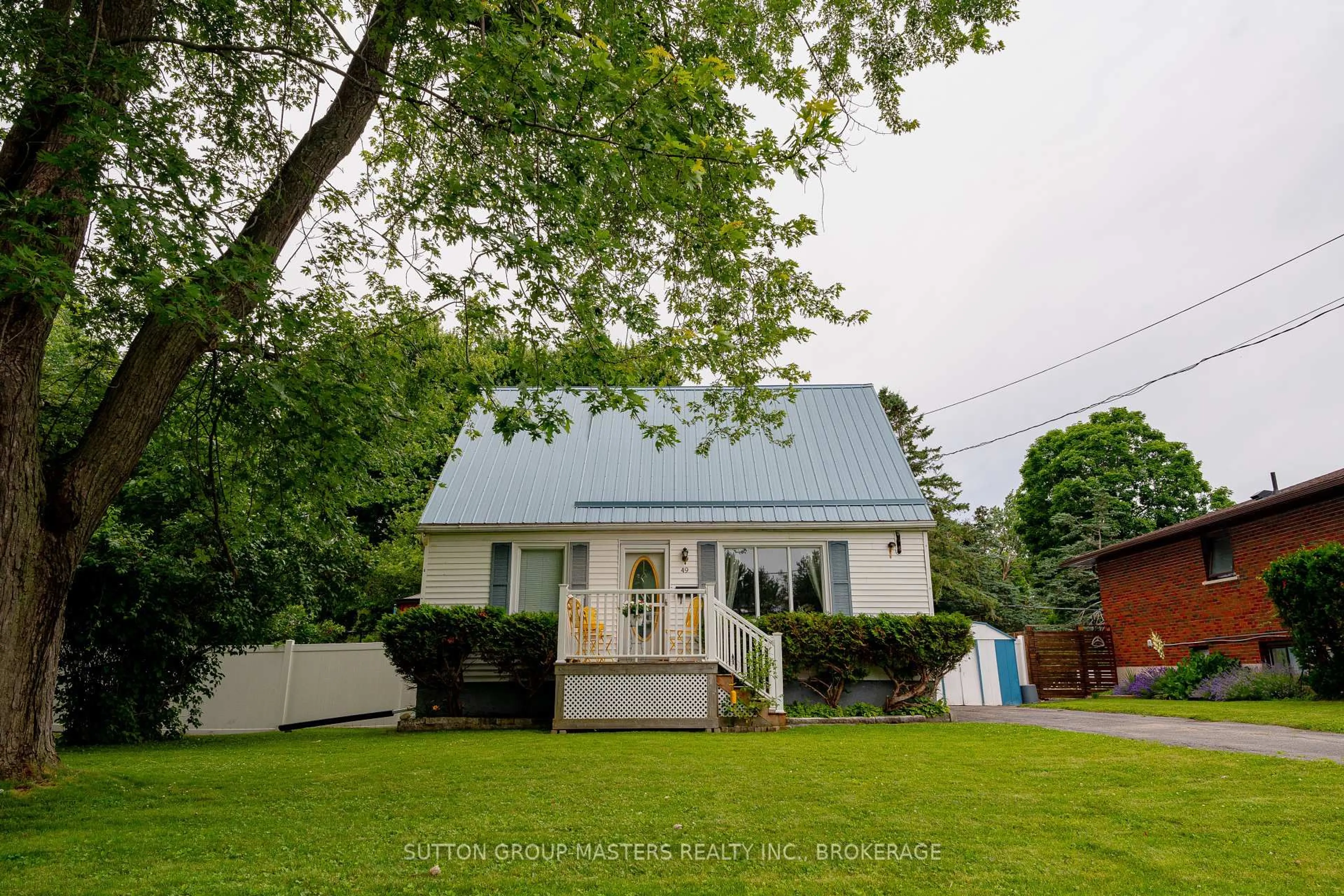 A pic from outside/outdoor area/front of a property/back of a property/a pic from drone, street for 49 Sunny Acres Rd, Kingston Ontario K7M 3N3