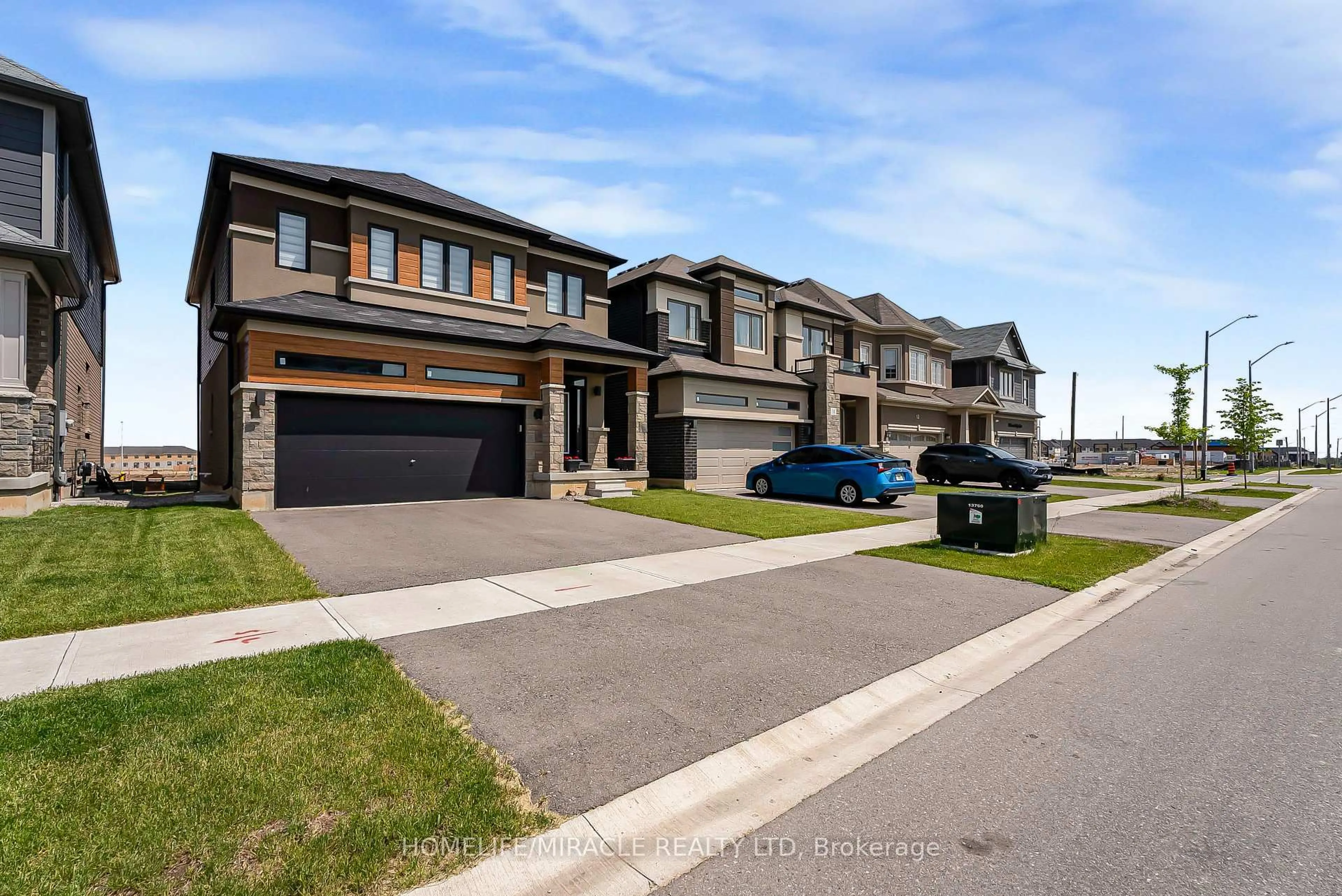 Home with brick exterior material, street for 16 Scenic Ridge Gate, Brant Ontario N3L 0K4