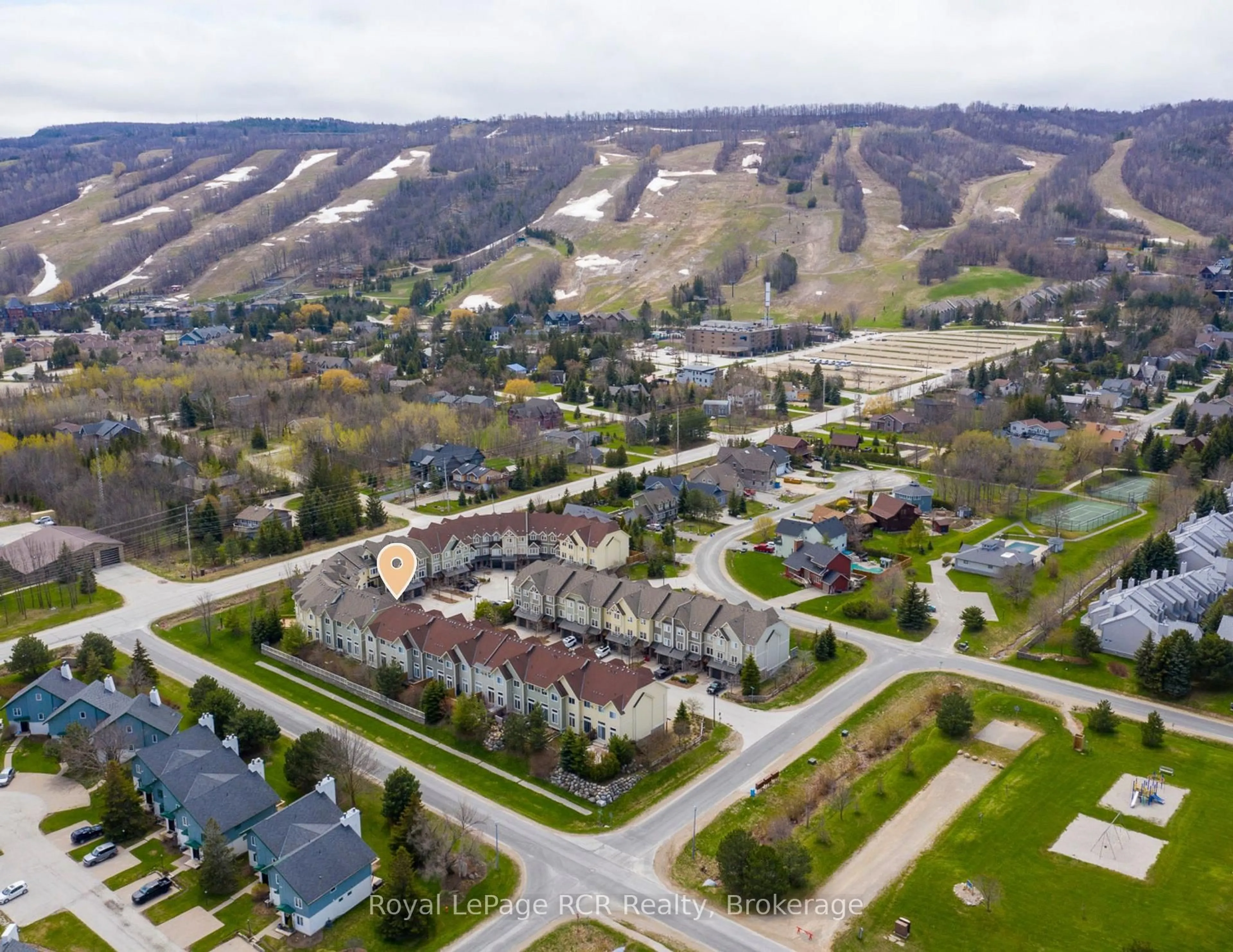 A pic from outside/outdoor area/front of a property/back of a property/a pic from drone, mountain view for 104 Farm Gate Rd #10, Blue Mountains Ontario L9Y 0L7