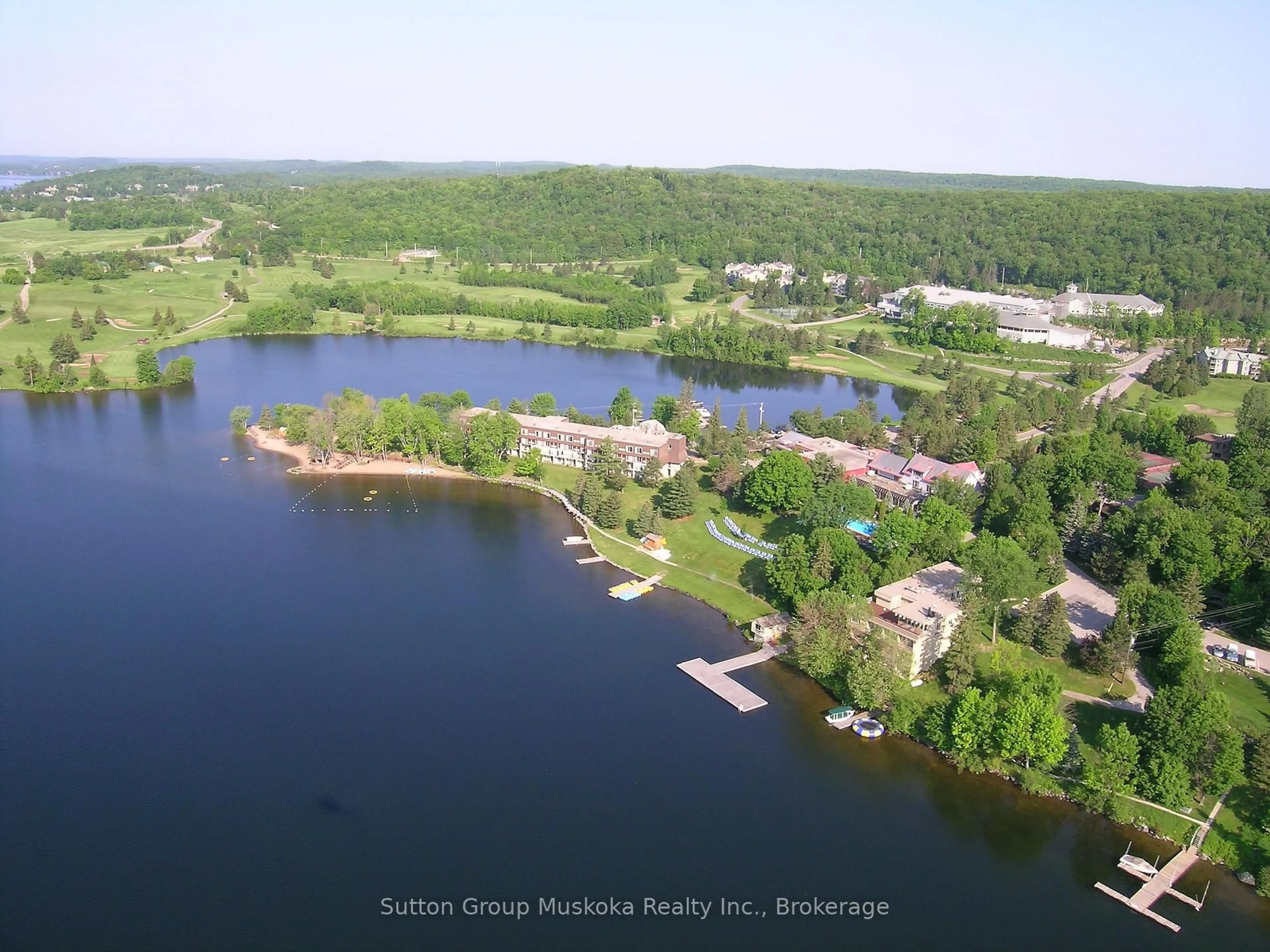 A pic from outside/outdoor area/front of a property/back of a property/a pic from drone, water/lake/river/ocean view for 1235 Deerhurst Dr #215 Bayshore, Huntsville Ontario P1H 2E8