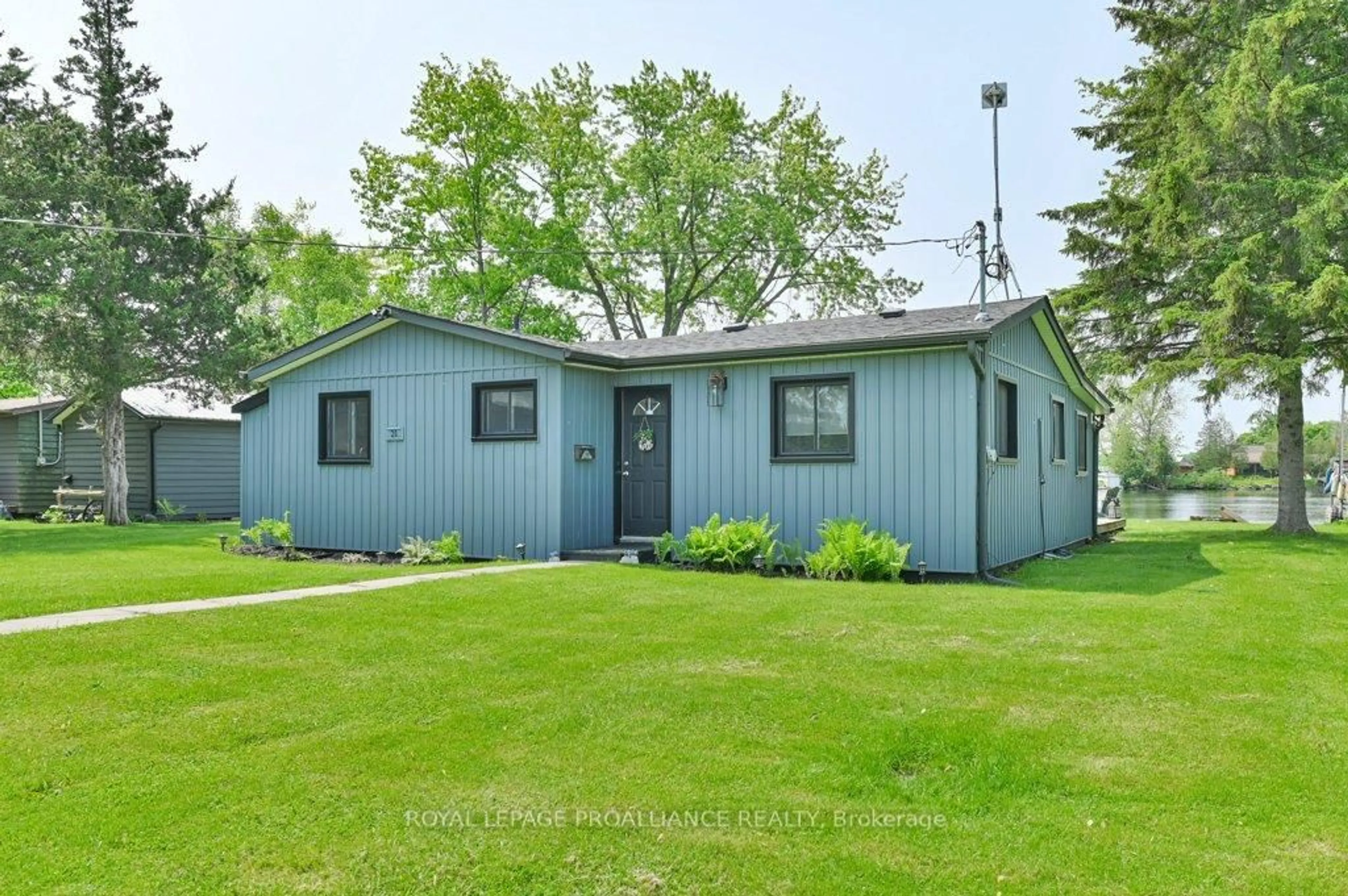Home with vinyl exterior material, street for 20 Rodgers Rd, Hastings Ontario K0K 2C0