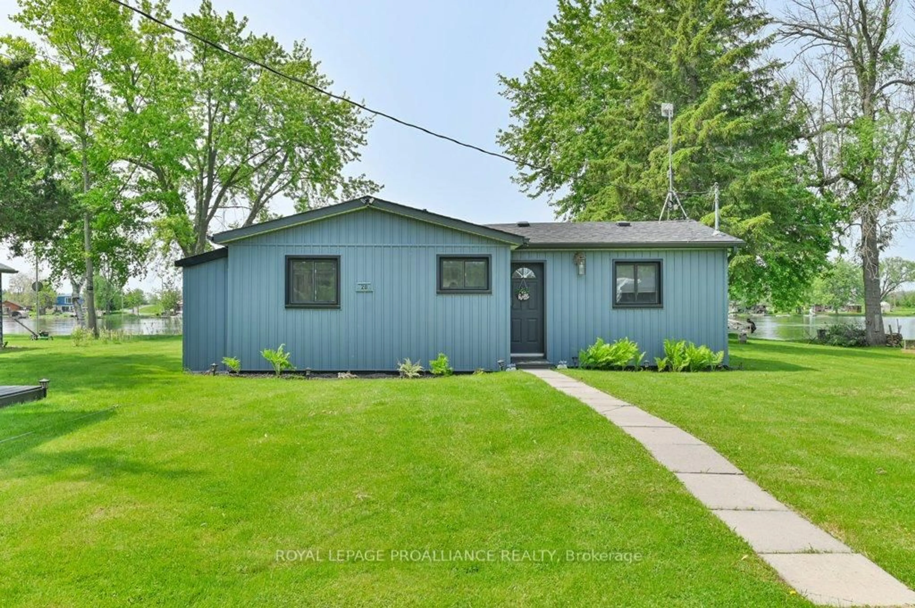 Home with vinyl exterior material, street for 20 Rodgers Rd, Hastings Ontario K0K 2C0