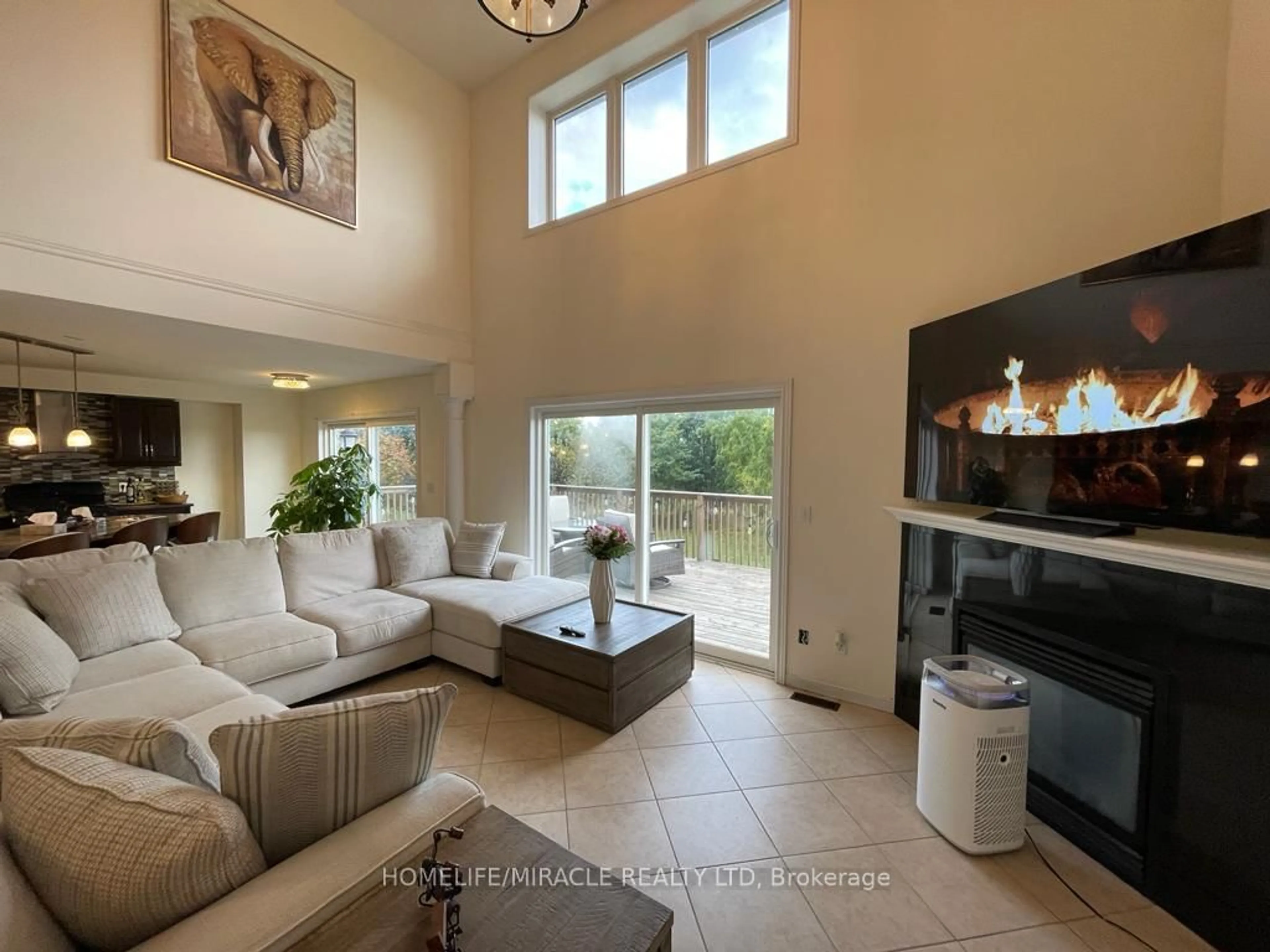 Living room with furniture, ceramic/tile floor for 455 Champlain Ave, Woodstock Ontario N4V 0B3