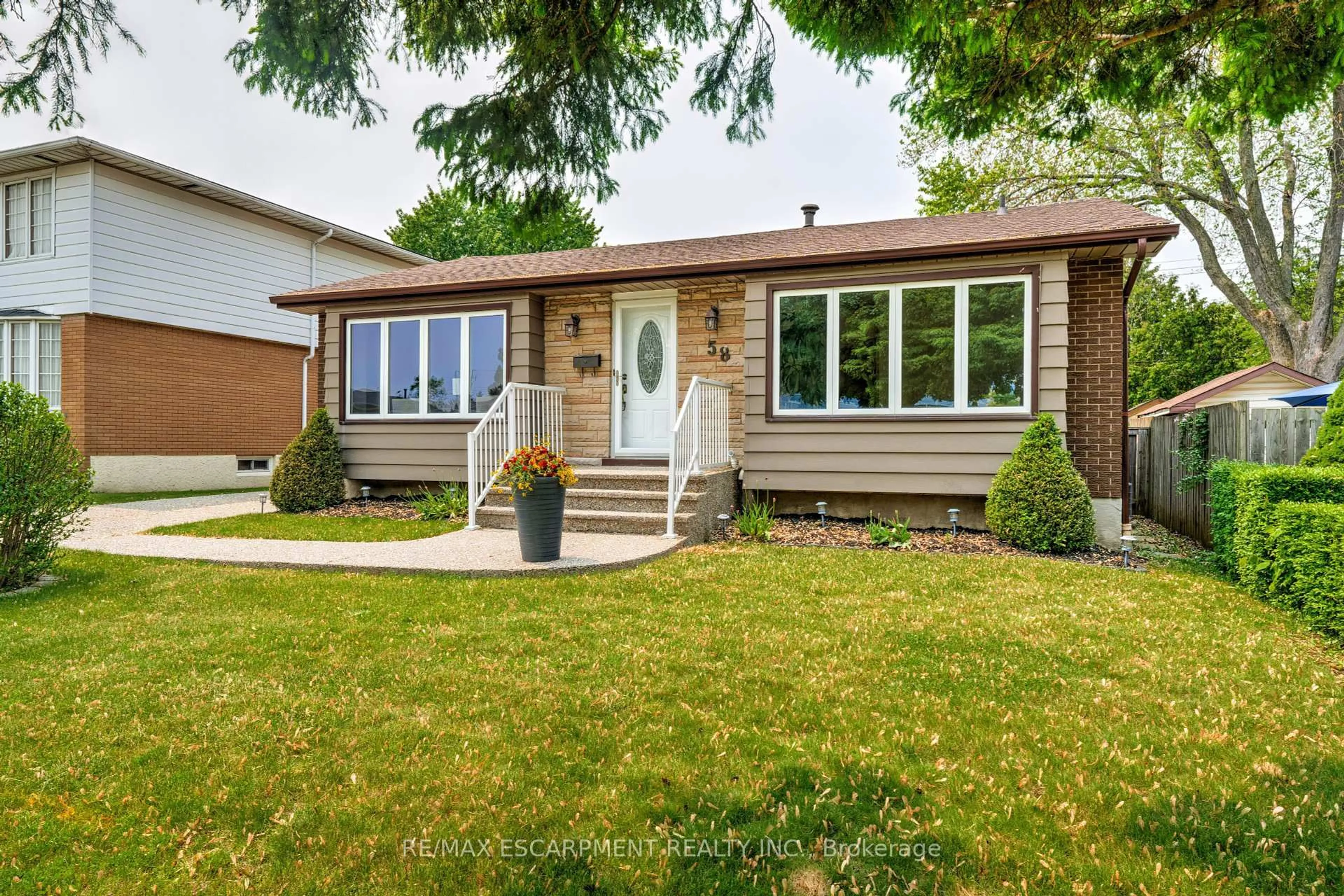Home with vinyl exterior material, street for 58 GOLDFINCH Rd, Hamilton Ontario L9A 3W7
