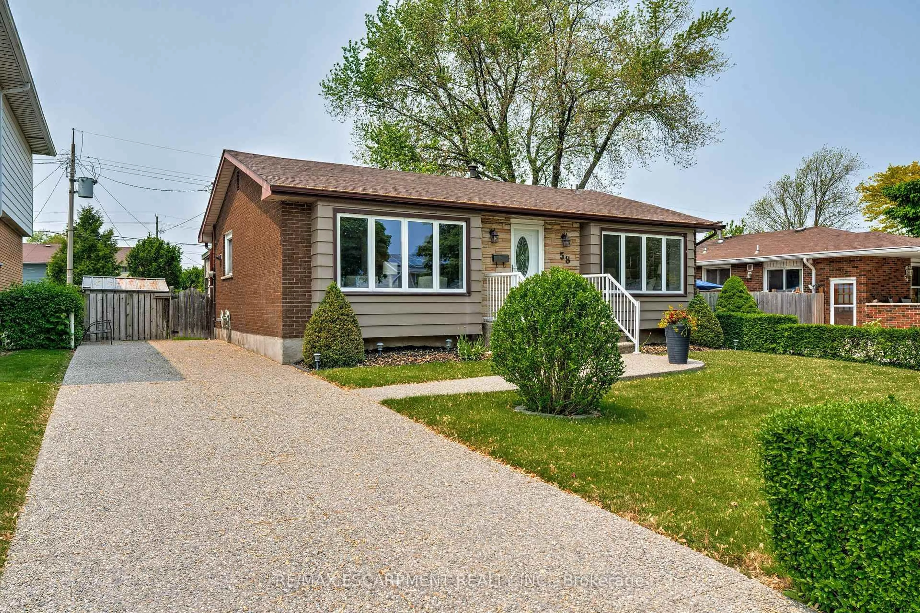 Home with brick exterior material, street for 58 GOLDFINCH Rd, Hamilton Ontario L9A 3W7