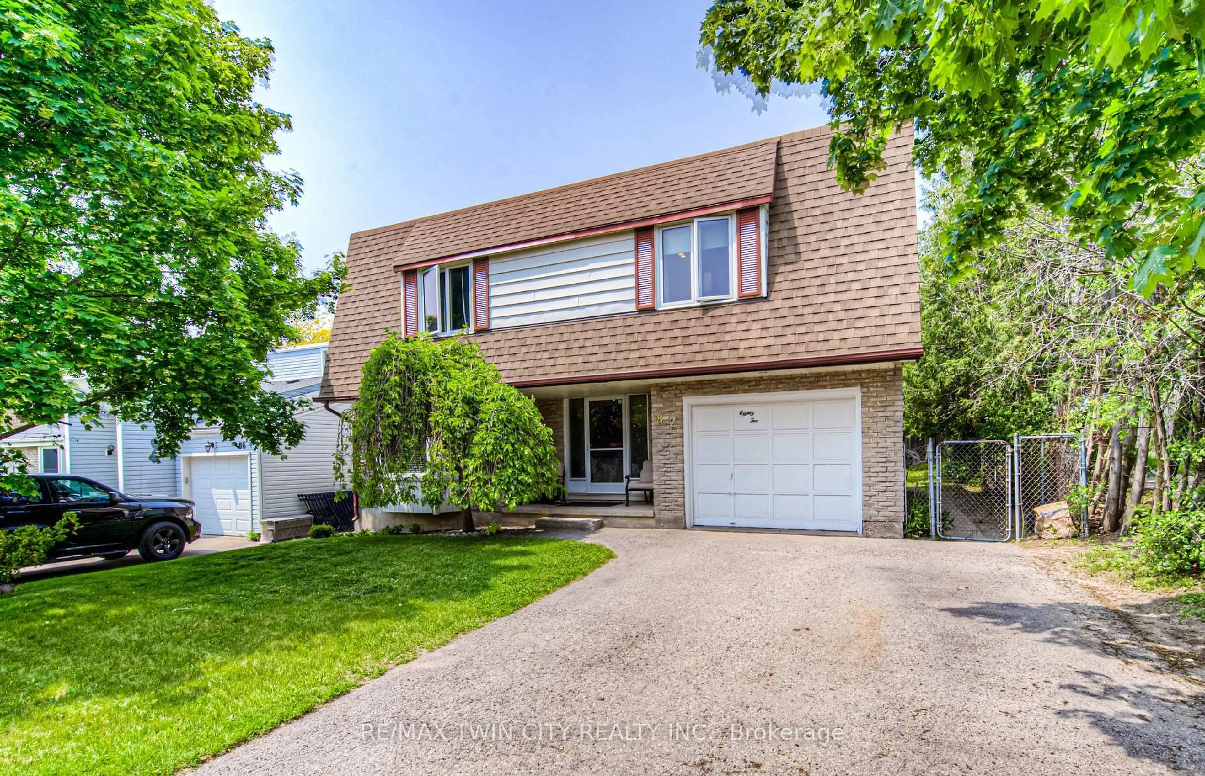 Home with vinyl exterior material, street for 82 Roseneath Cres, Kitchener Ontario N2E 1V9