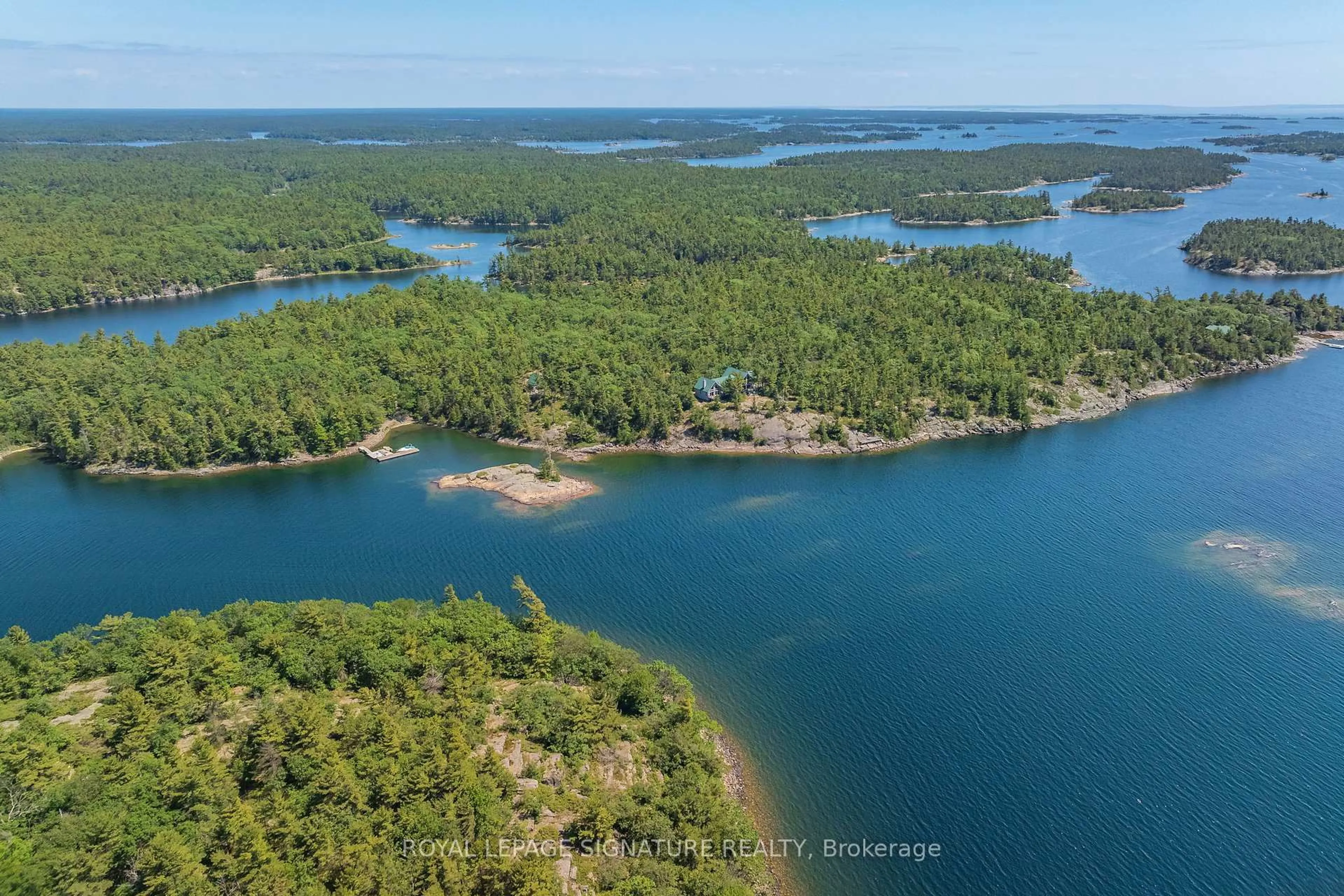 A pic from outside/outdoor area/front of a property/back of a property/a pic from drone, water/lake/river/ocean view for B350 Echo Island, The Archipelago Ontario P2A 0A1