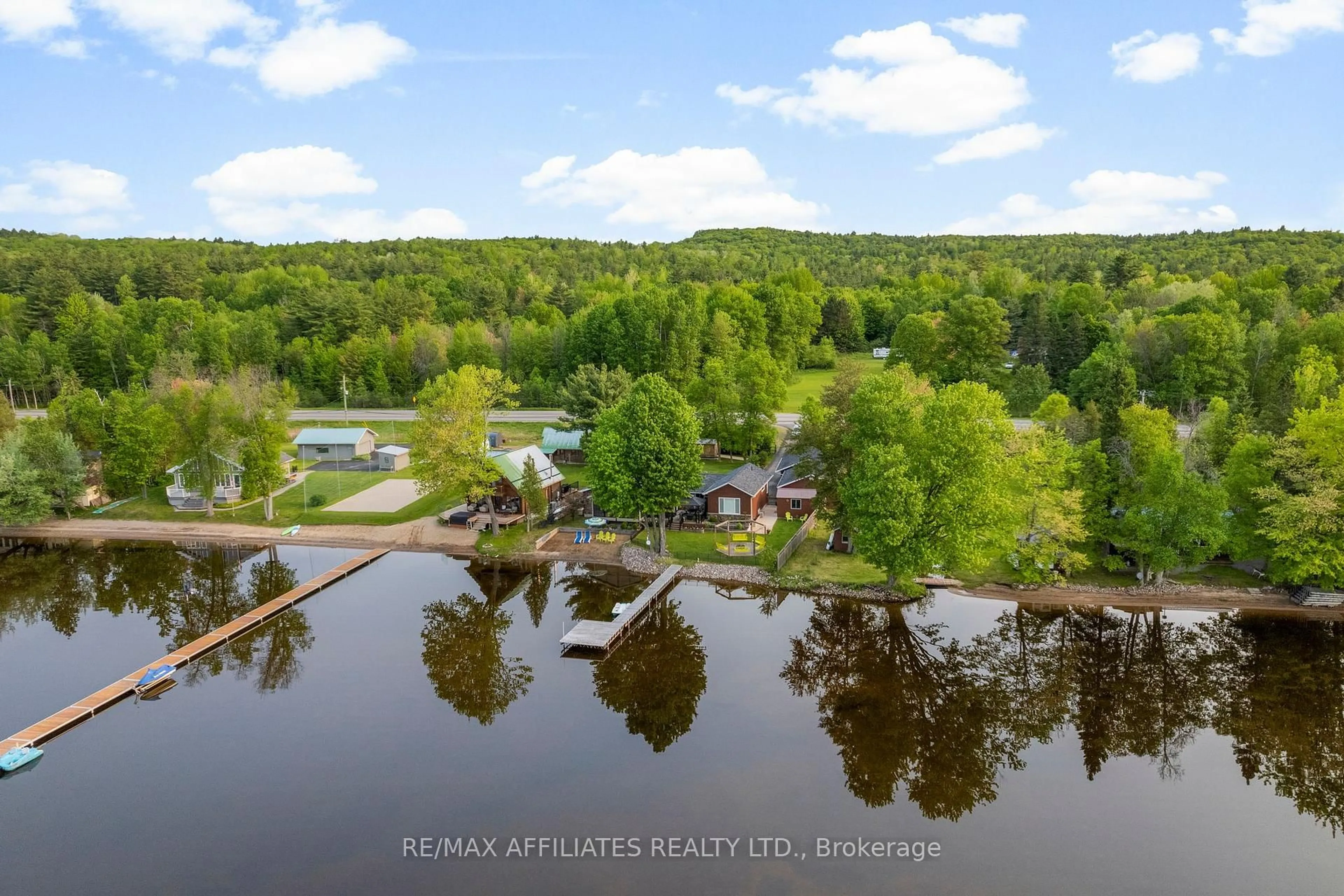 A pic from outside/outdoor area/front of a property/back of a property/a pic from drone, water/lake/river/ocean view for 12341 HIGHWAY 60, Golden Lake Ontario K0J 1X0