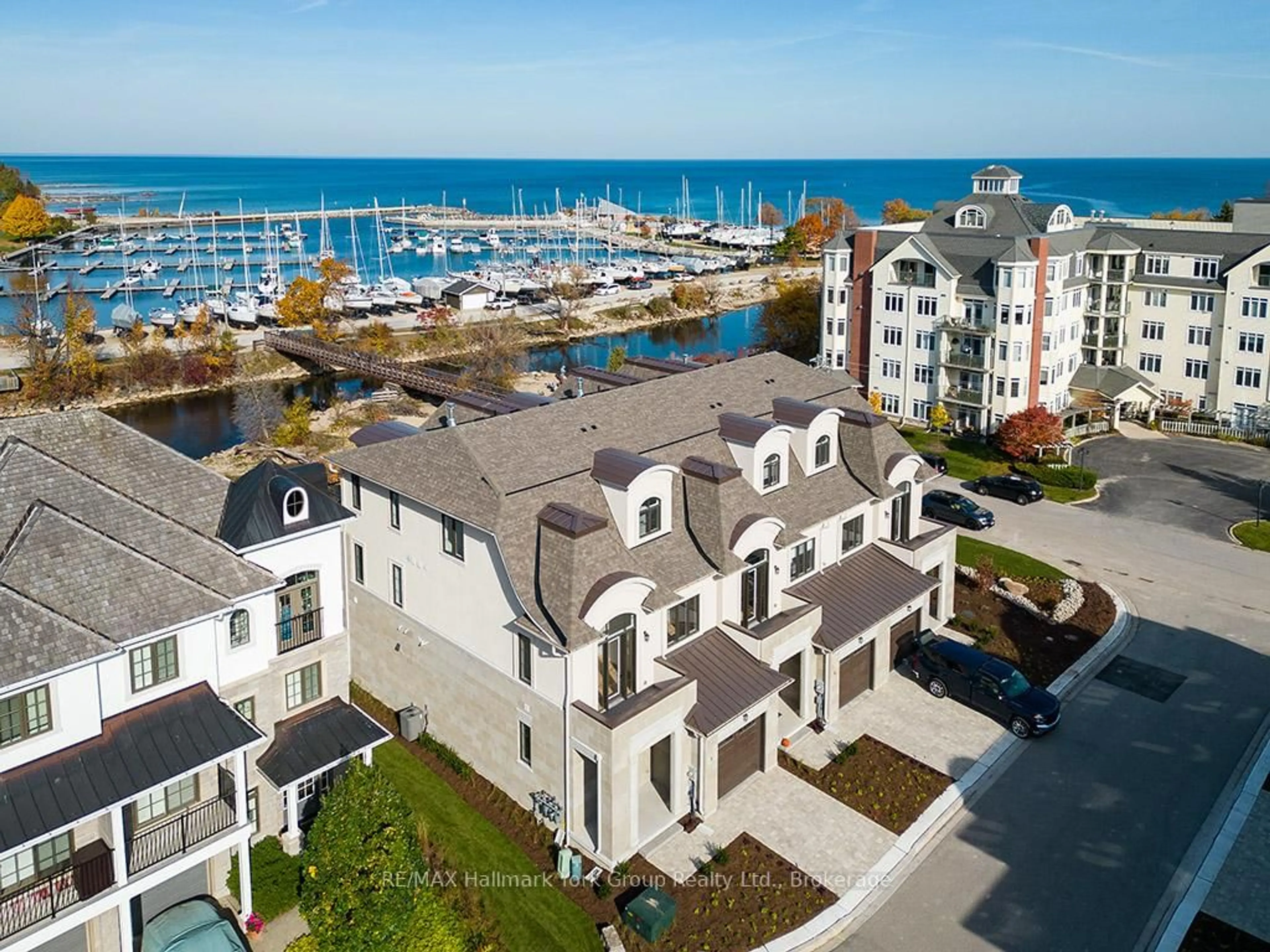 A pic from outside/outdoor area/front of a property/back of a property/a pic from drone, water/lake/river/ocean view for 5-11 Bay St, Blue Mountains Ontario N0H 2P0