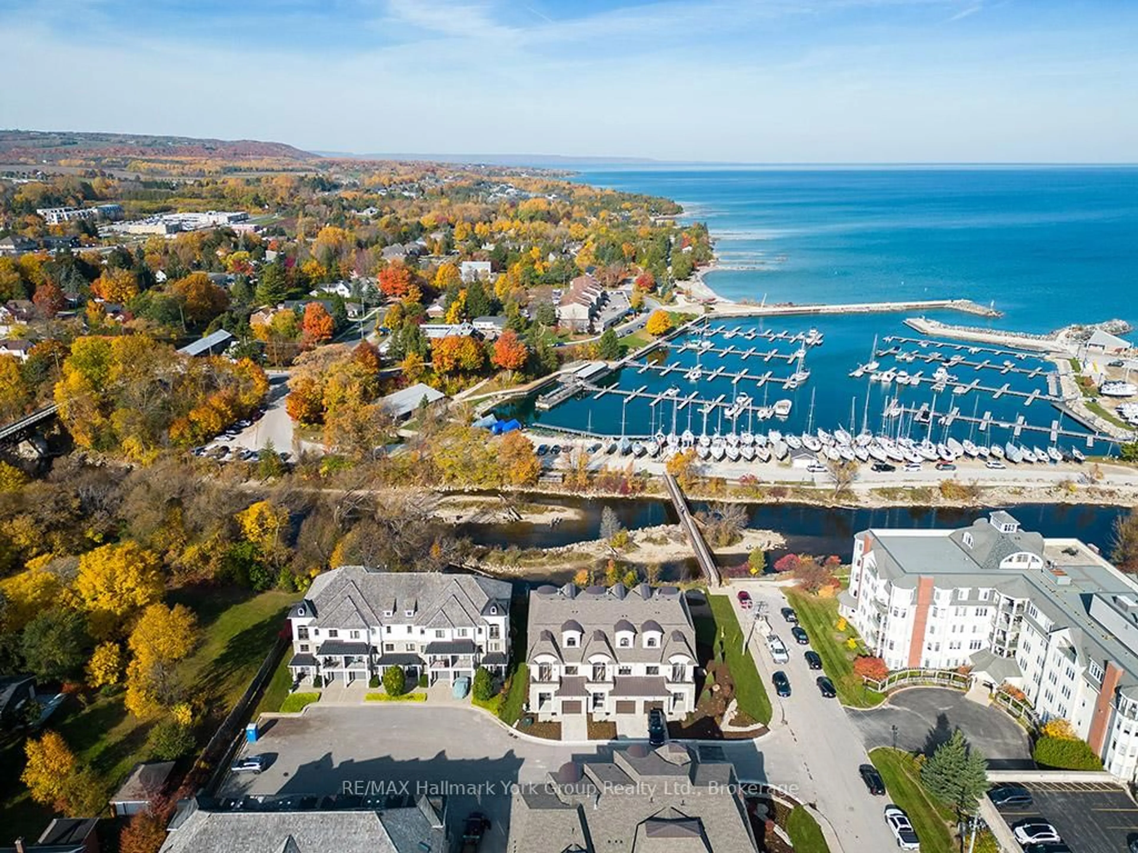 A pic from outside/outdoor area/front of a property/back of a property/a pic from drone, water/lake/river/ocean view for 5-11 Bay St, Blue Mountains Ontario N0H 2P0