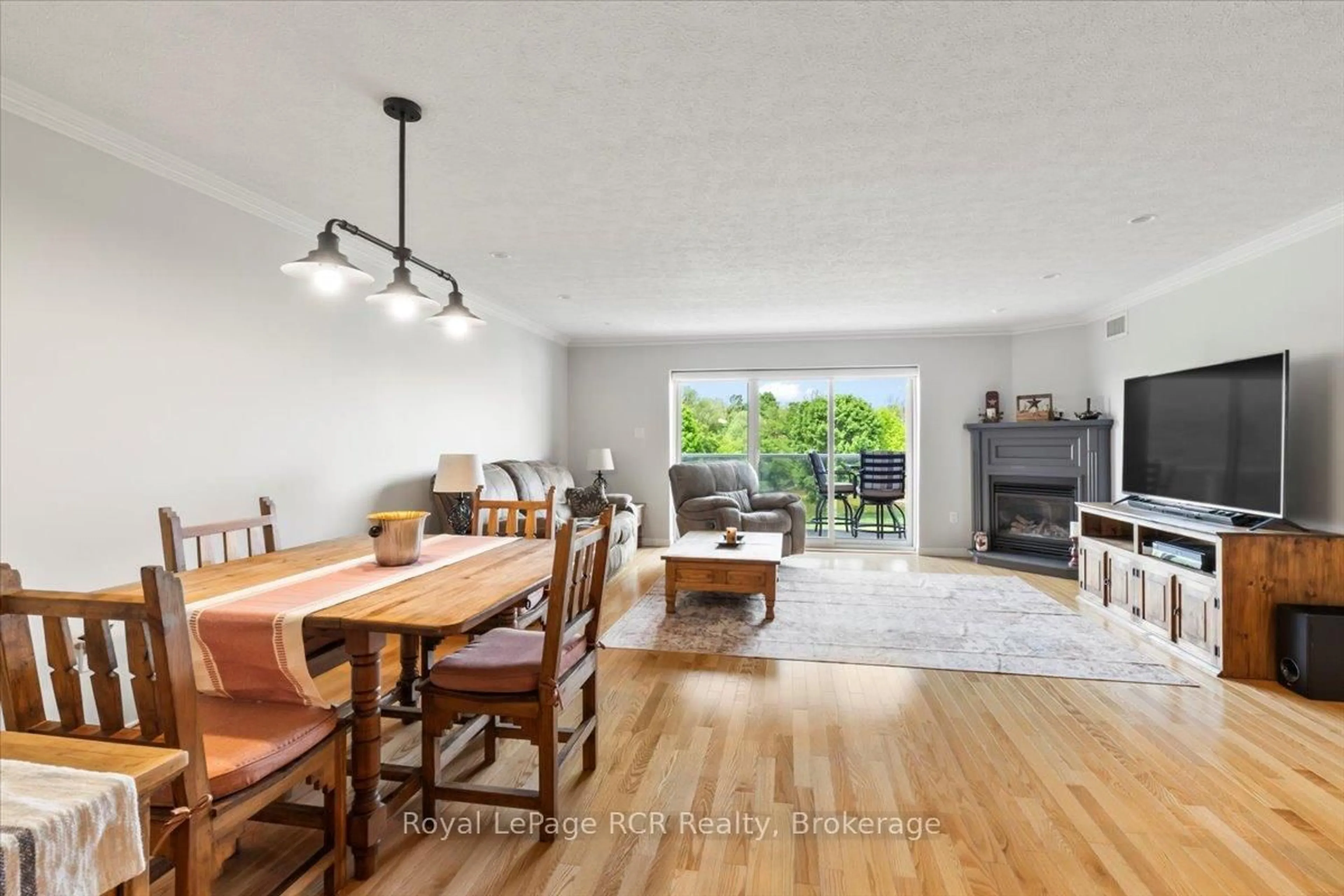 Living room with furniture, wood/laminate floor for 85 William St #303, Brockton Ontario N0G 2V0