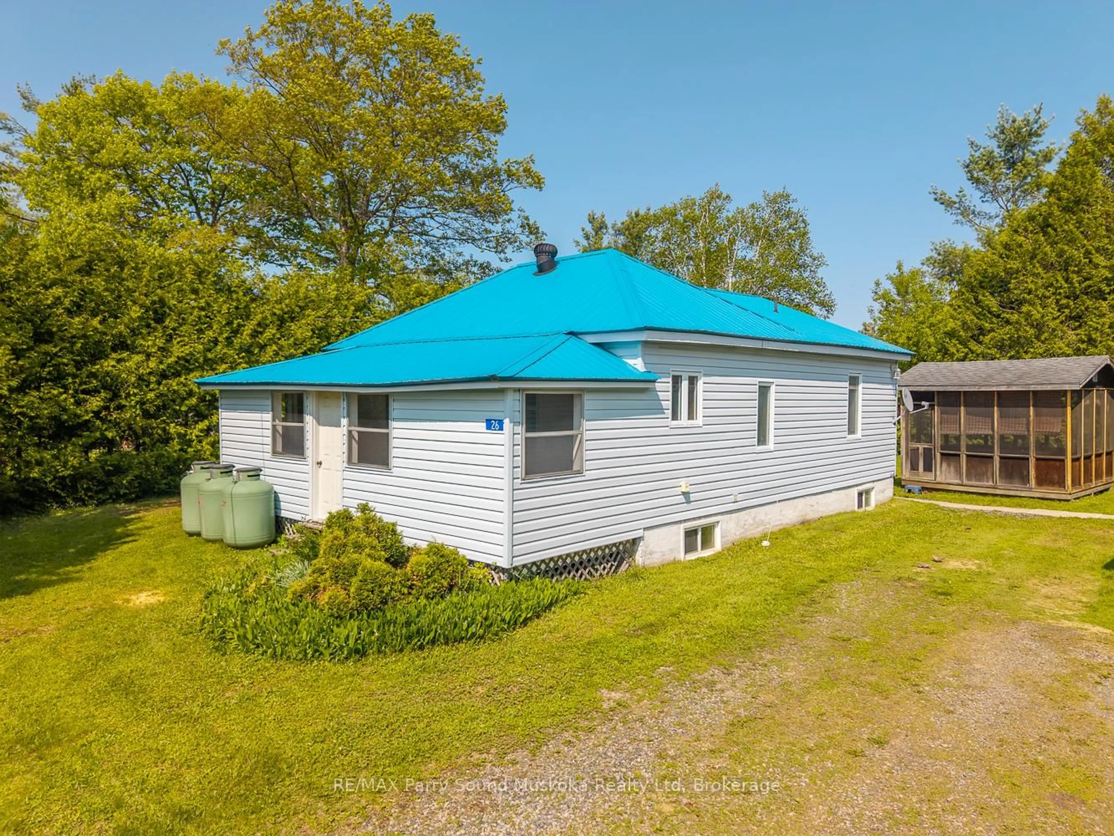 A pic from outside/outdoor area/front of a property/back of a property/a pic from drone, building for 26 Joesph St, Georgian Bay Ontario P0C 1H0