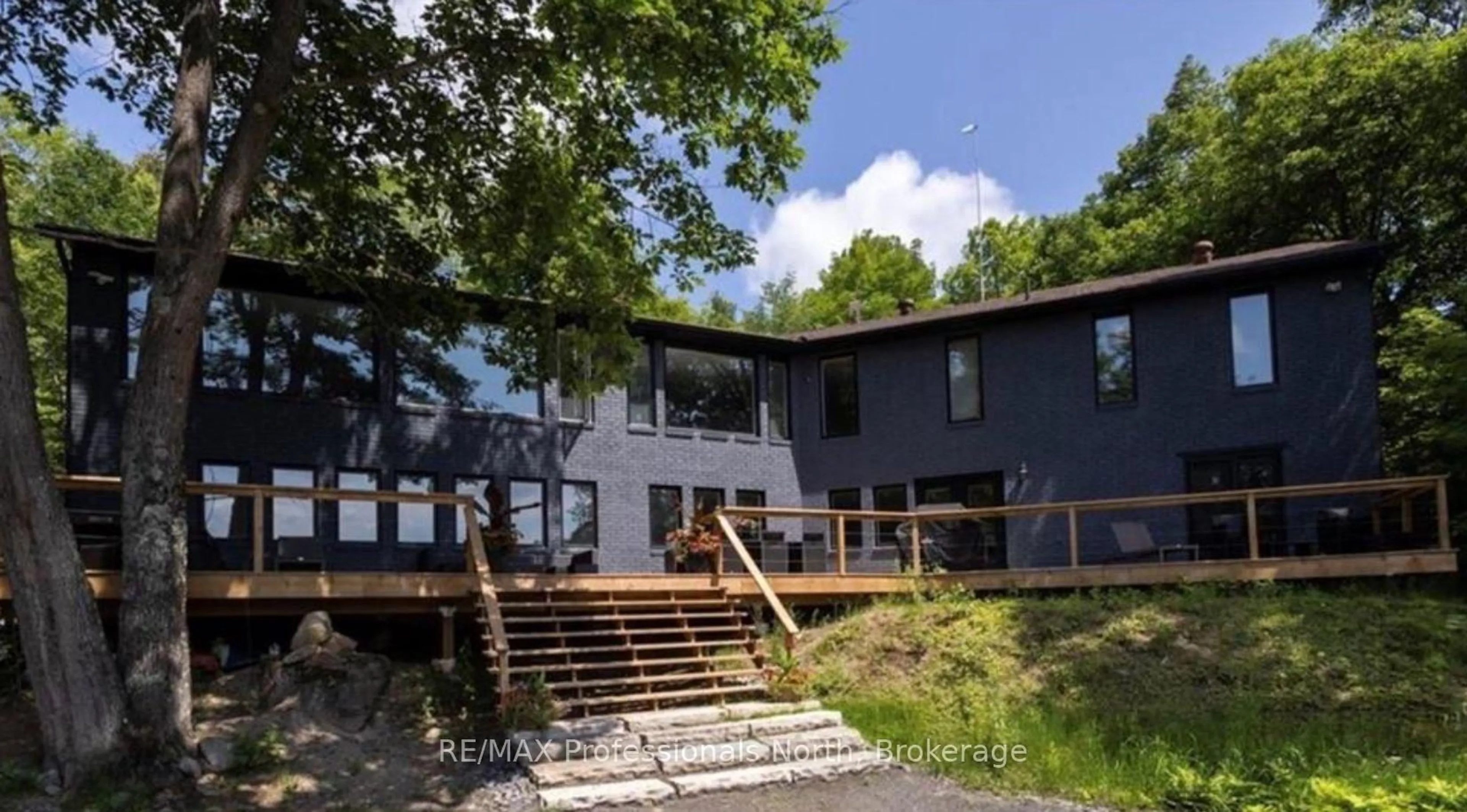 A pic from outside/outdoor area/front of a property/back of a property/a pic from drone, water/lake/river/ocean view for 1023 South Ril Lake Rd, Lake of Bays Ontario P0B 1A0