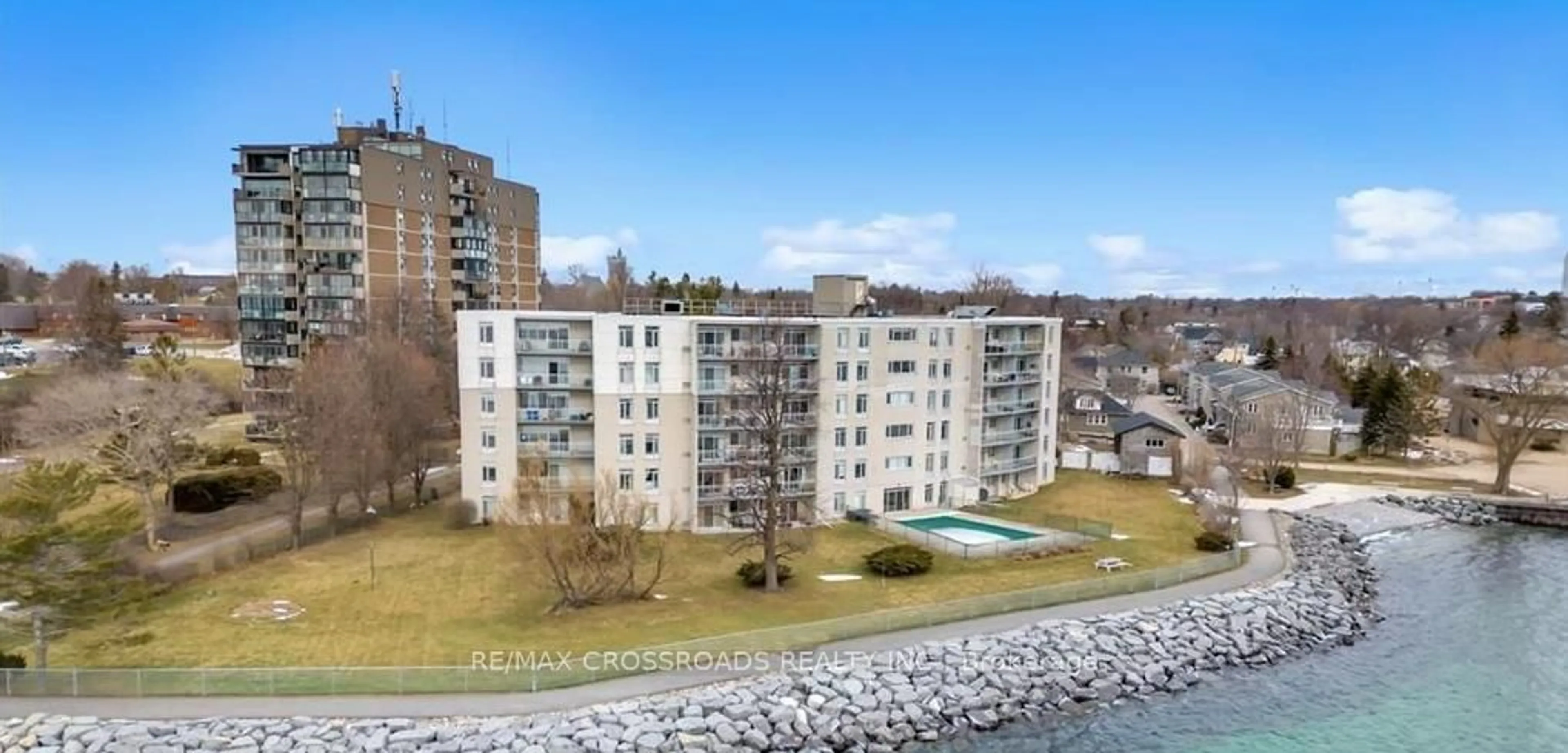 A pic from outside/outdoor area/front of a property/back of a property/a pic from drone, water/lake/river/ocean view for 1 Mowat Ave #209, Kingston Ontario K7M 1J8