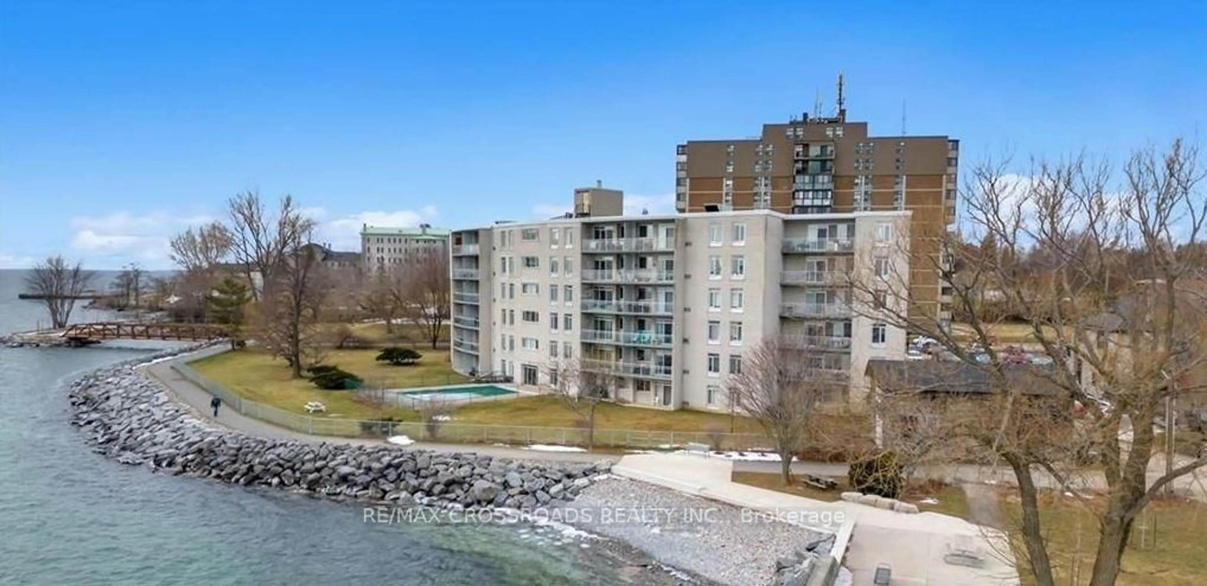 A pic from outside/outdoor area/front of a property/back of a property/a pic from drone, water/lake/river/ocean view for 1 Mowat Ave #209, Kingston Ontario K7M 1J8