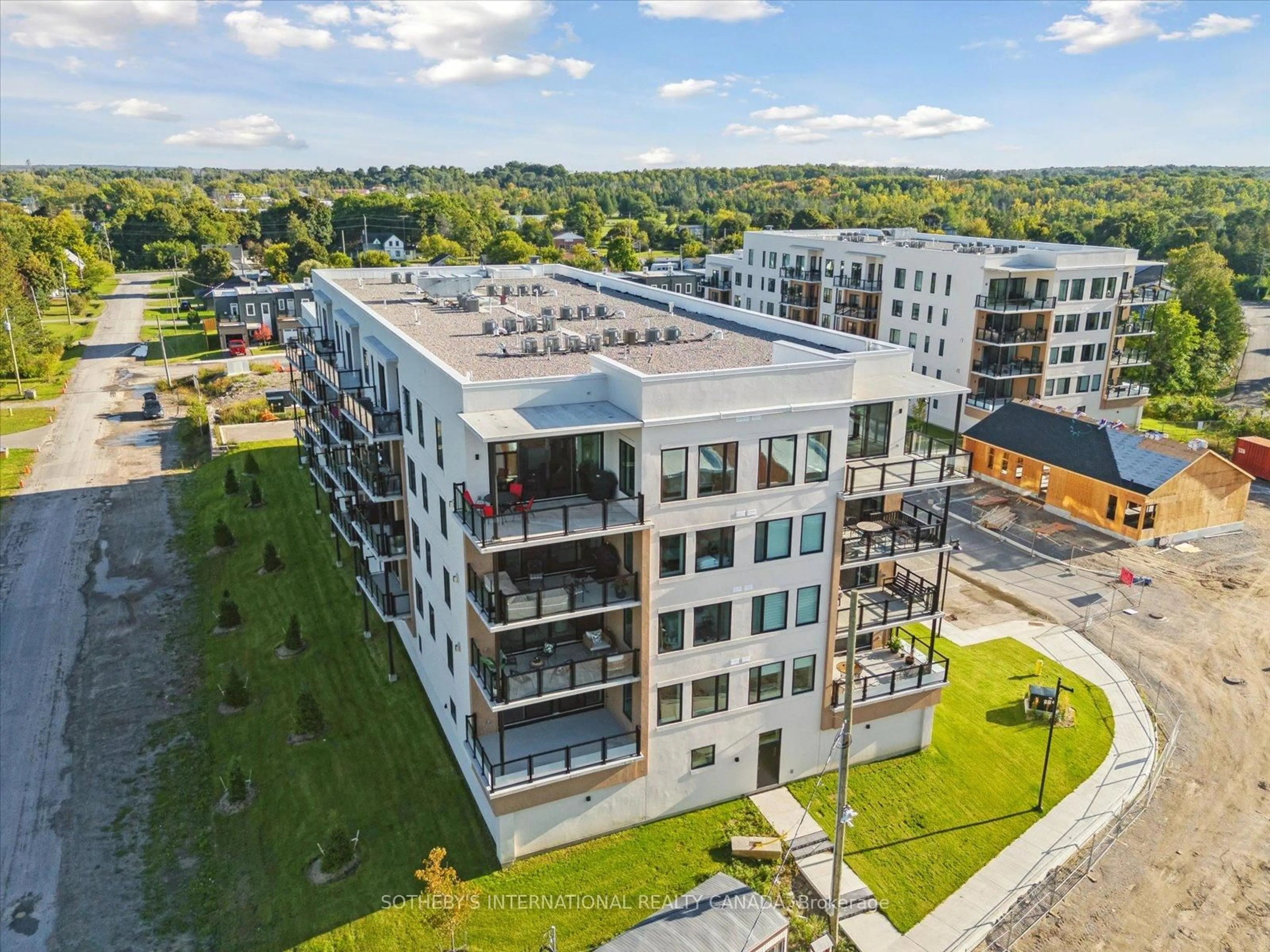 A pic from outside/outdoor area/front of a property/back of a property/a pic from drone, building for 19B West St #404, Kawartha Lakes Ontario K0M 1N0